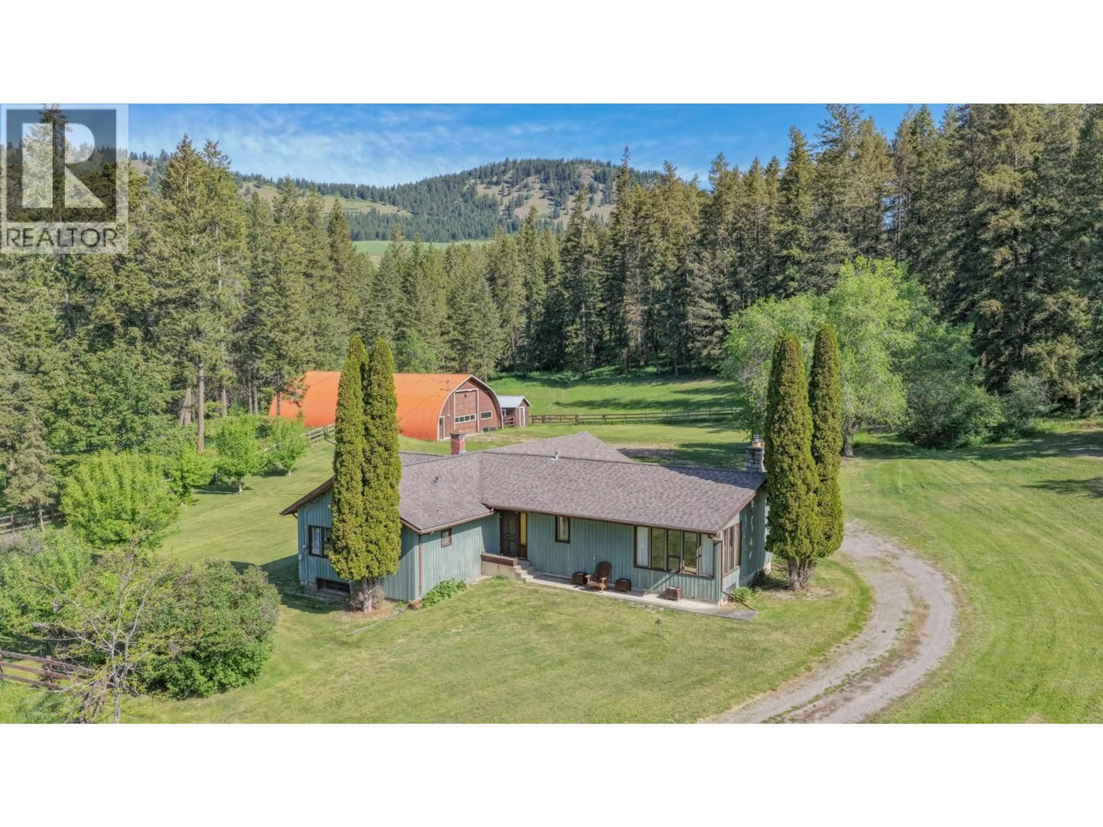 A pic from outside/outdoor area/front of a property/back of a property/a pic from drone, mountain view for 2471 6 HIGHWAY, Lumby British Columbia V0E2G1