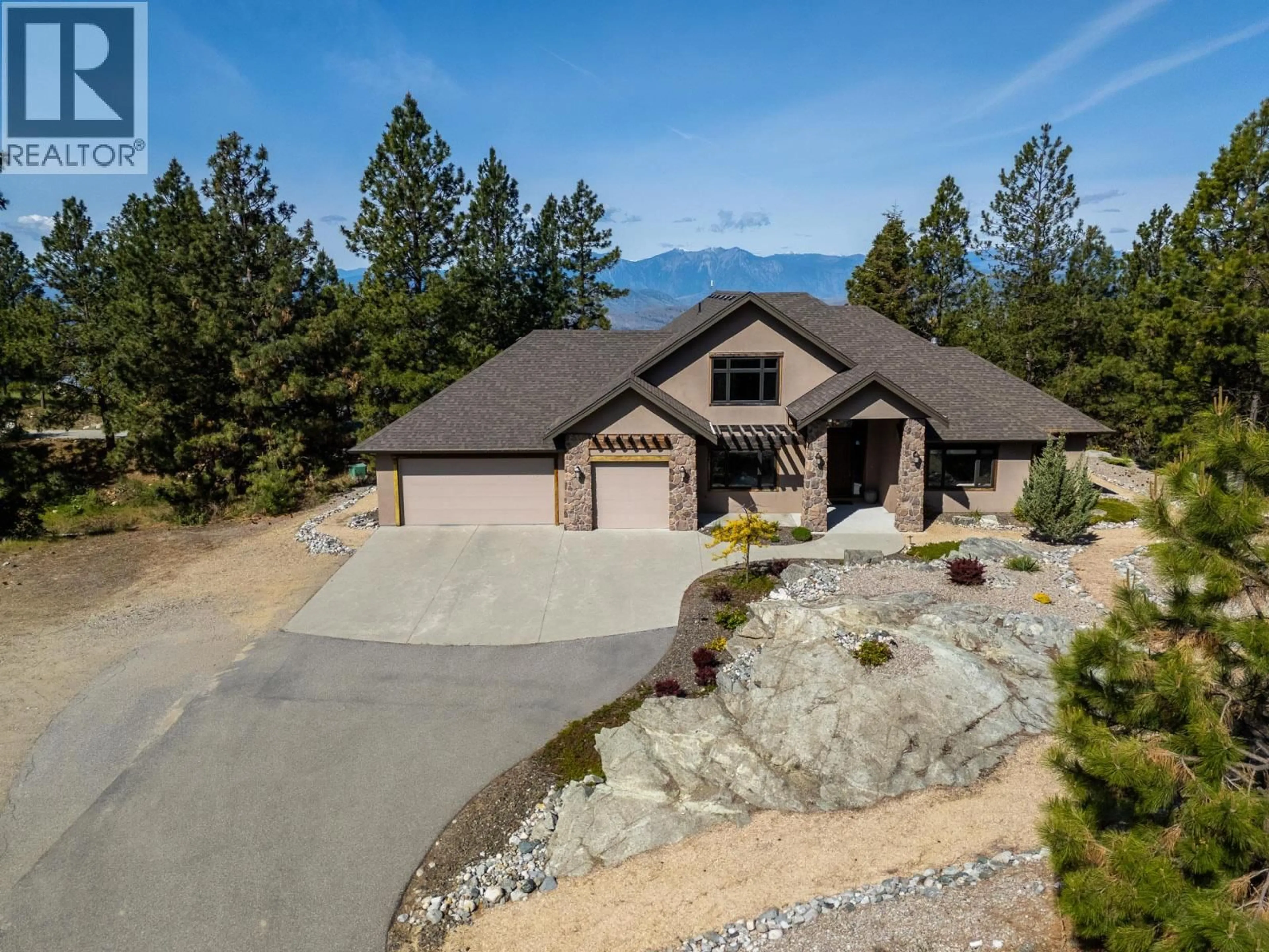 A pic from outside/outdoor area/front of a property/back of a property/a pic from drone, mountain view for 136 FALCON PLACE, Osoyoos British Columbia V0H1V6