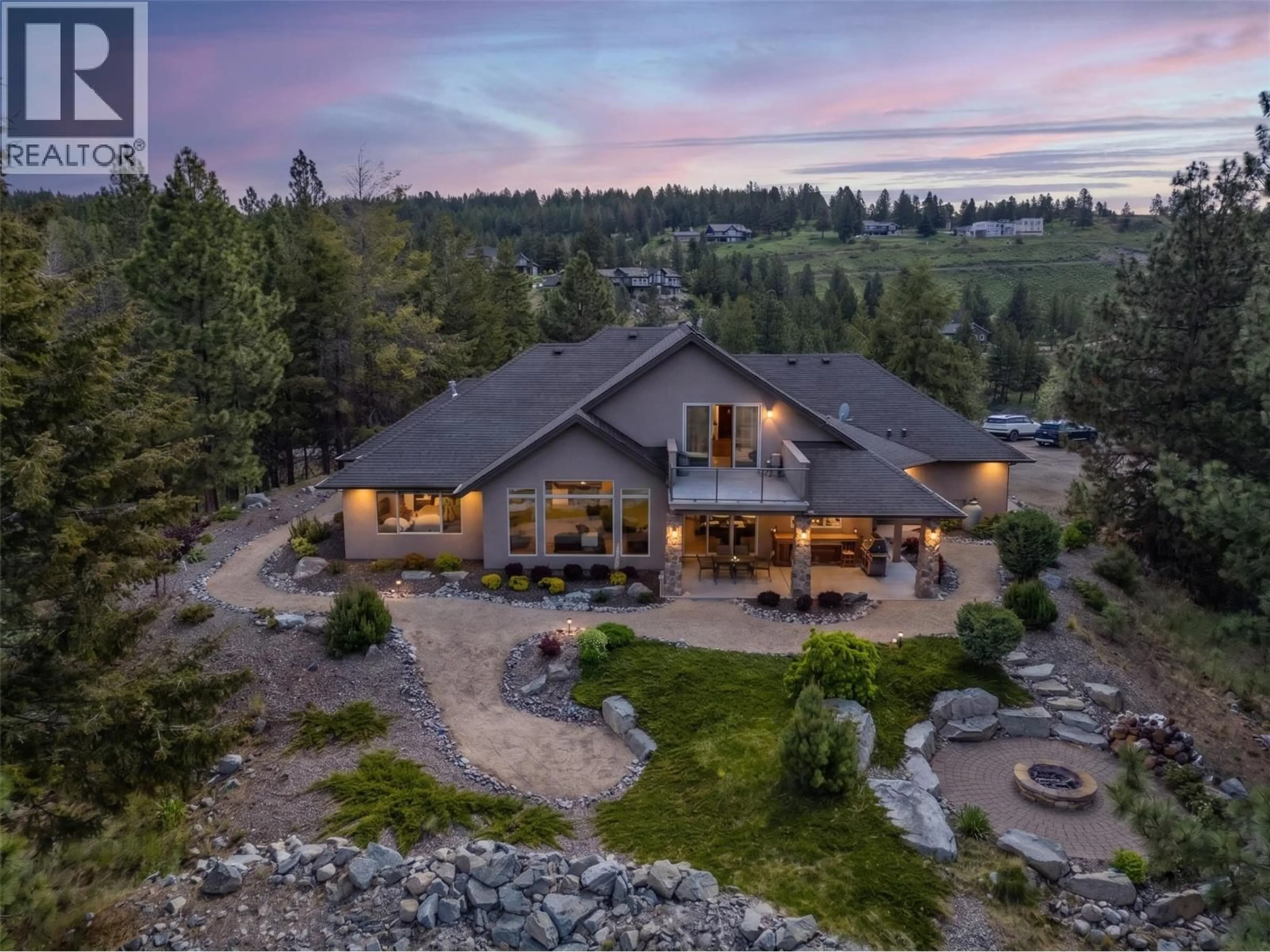 A pic from outside/outdoor area/front of a property/back of a property/a pic from drone, mountain view for 136 FALCON PLACE, Osoyoos British Columbia V0H1V6