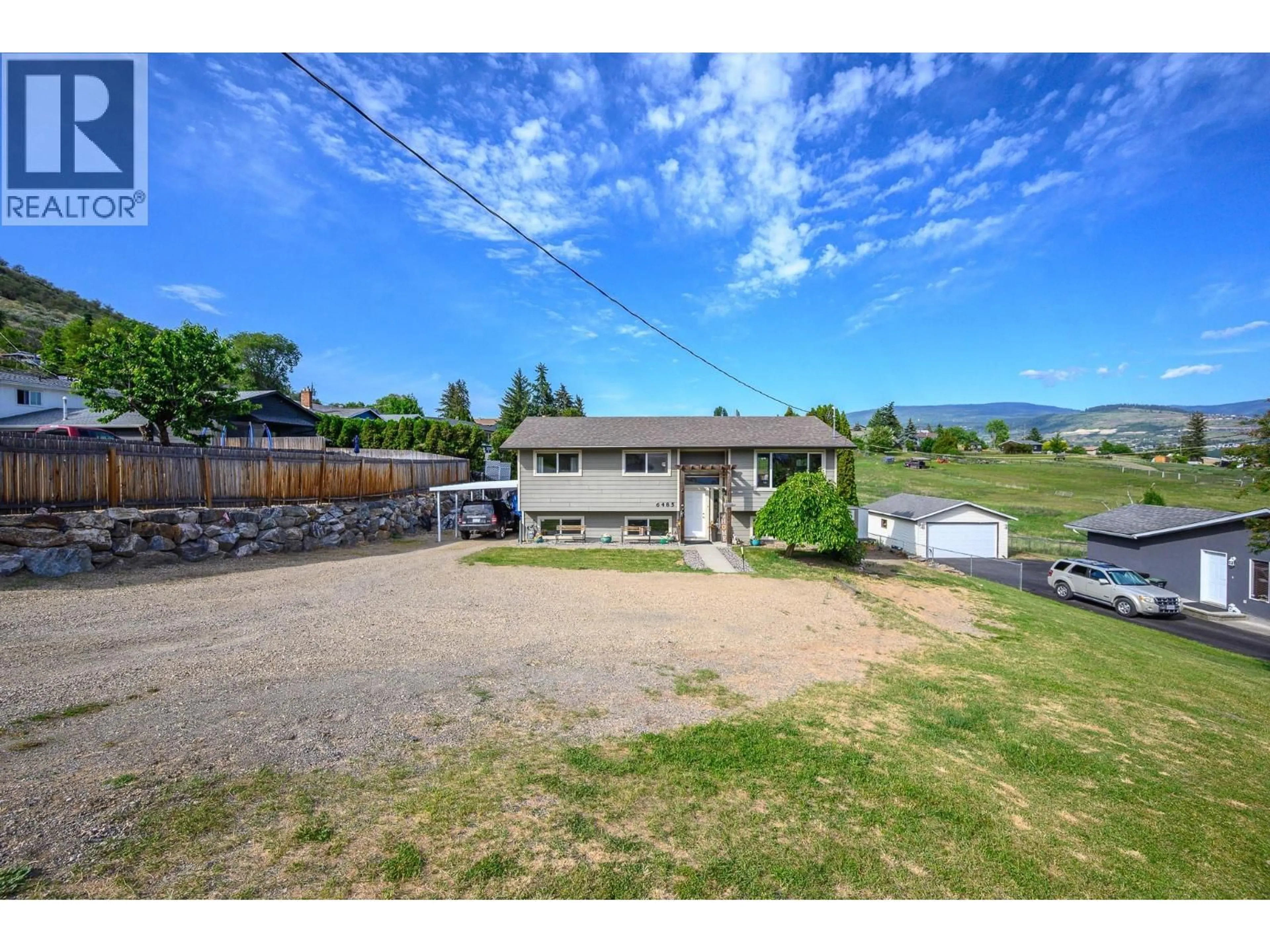 A pic from outside/outdoor area/front of a property/back of a property/a pic from drone, mountain view for 6485 CARDINAL ROAD, Vernon British Columbia V1H1W3