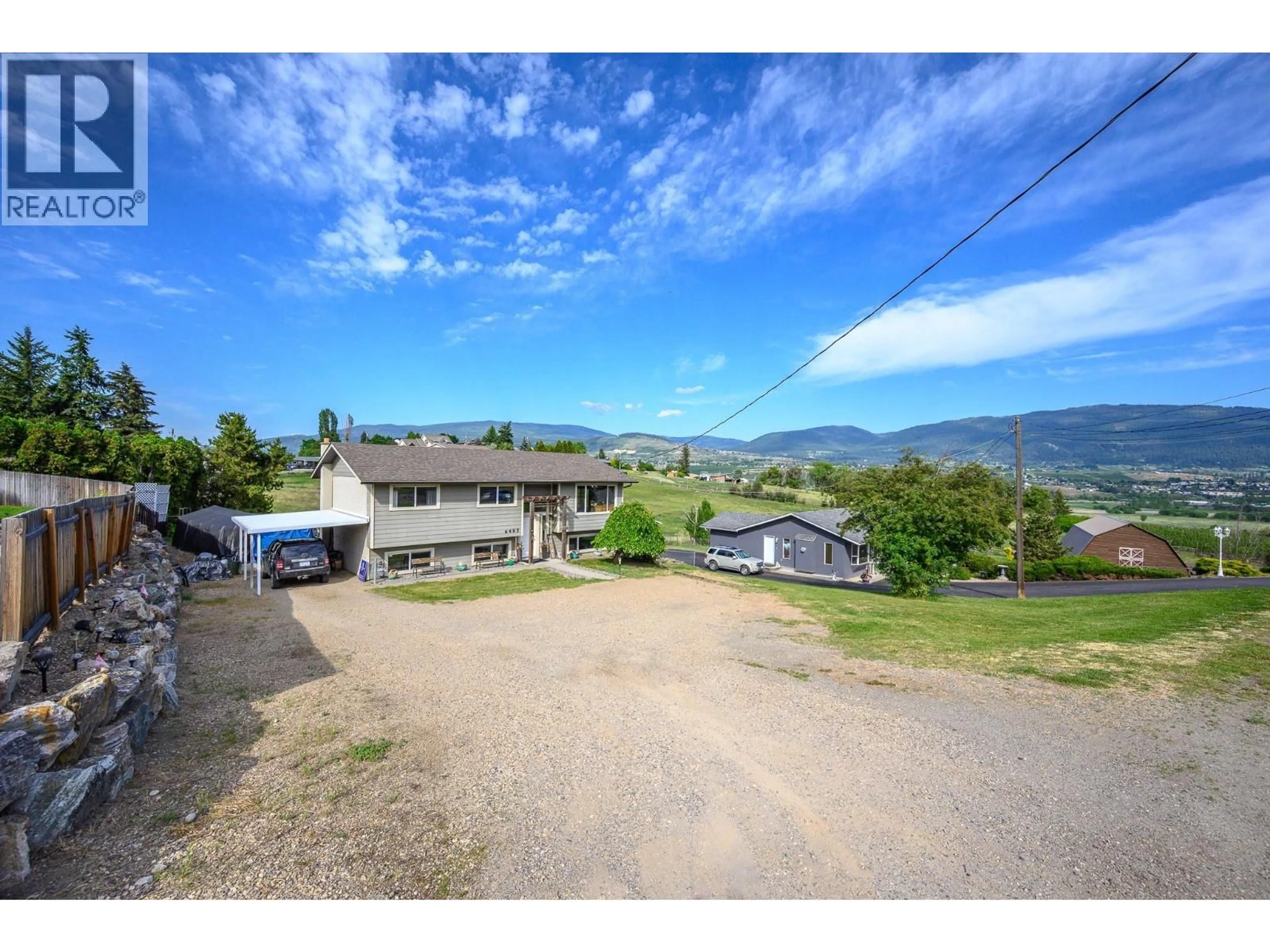 A pic from outside/outdoor area/front of a property/back of a property/a pic from drone, mountain view for 6485 CARDINAL ROAD, Vernon British Columbia V1H1W3