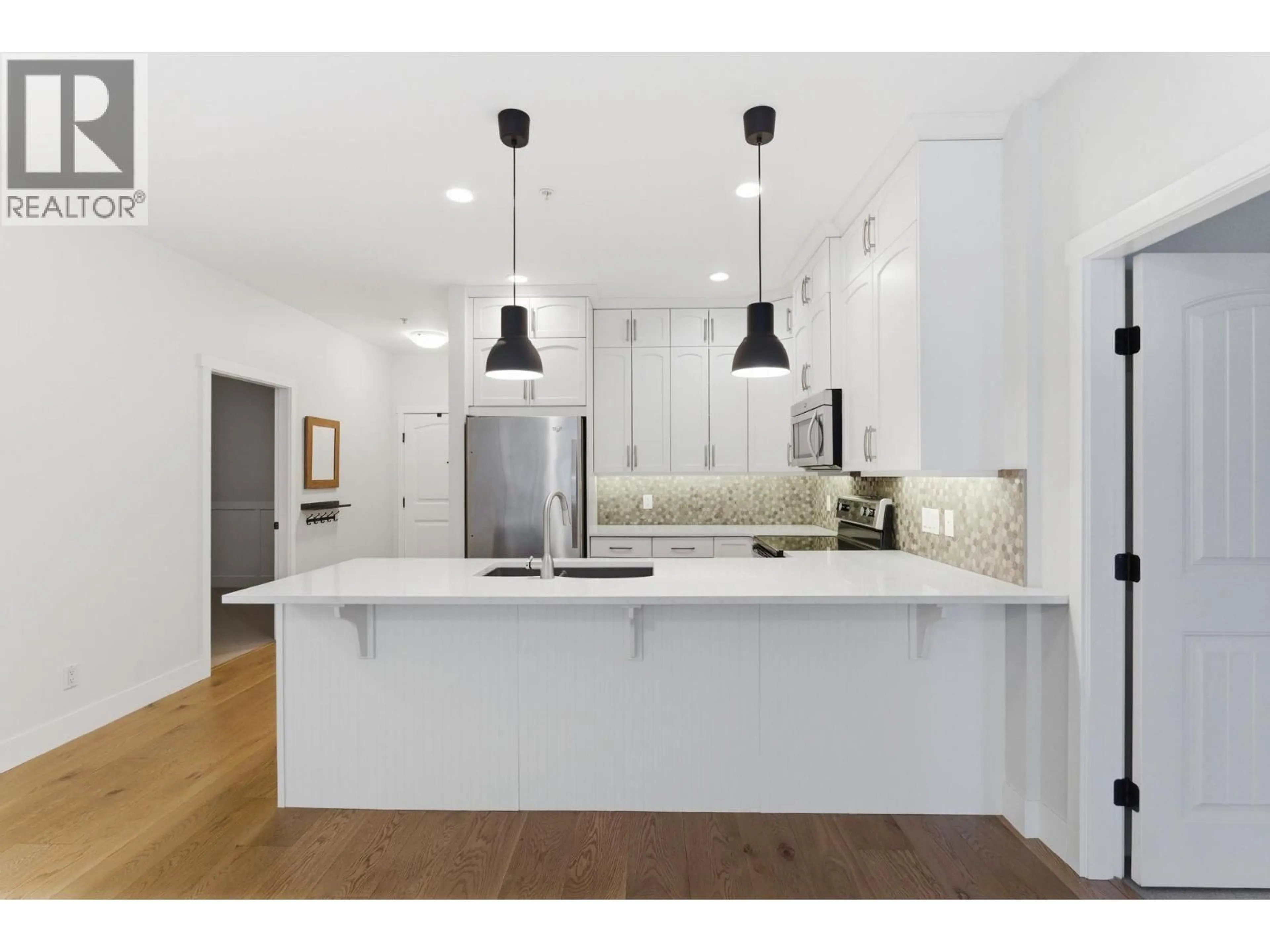 Open concept kitchen, unknown for 108 - 3739 CASORSO ROAD, Kelowna British Columbia V1W5E3
