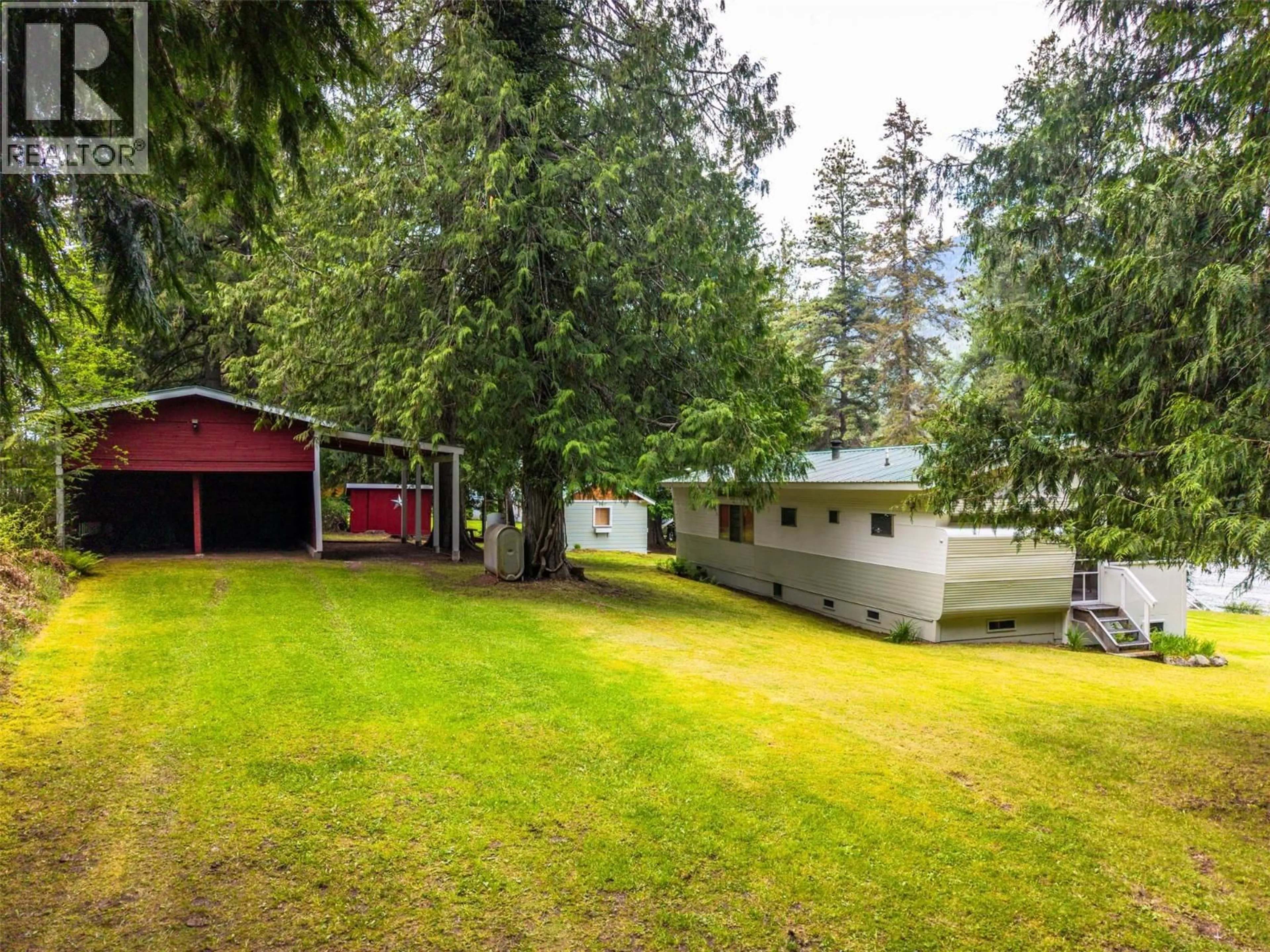 A pic from outside/outdoor area/front of a property/back of a property/a pic from drone, forest/trees view for 7397 BAXENDALE ROAD, Procter British Columbia V1L6R5