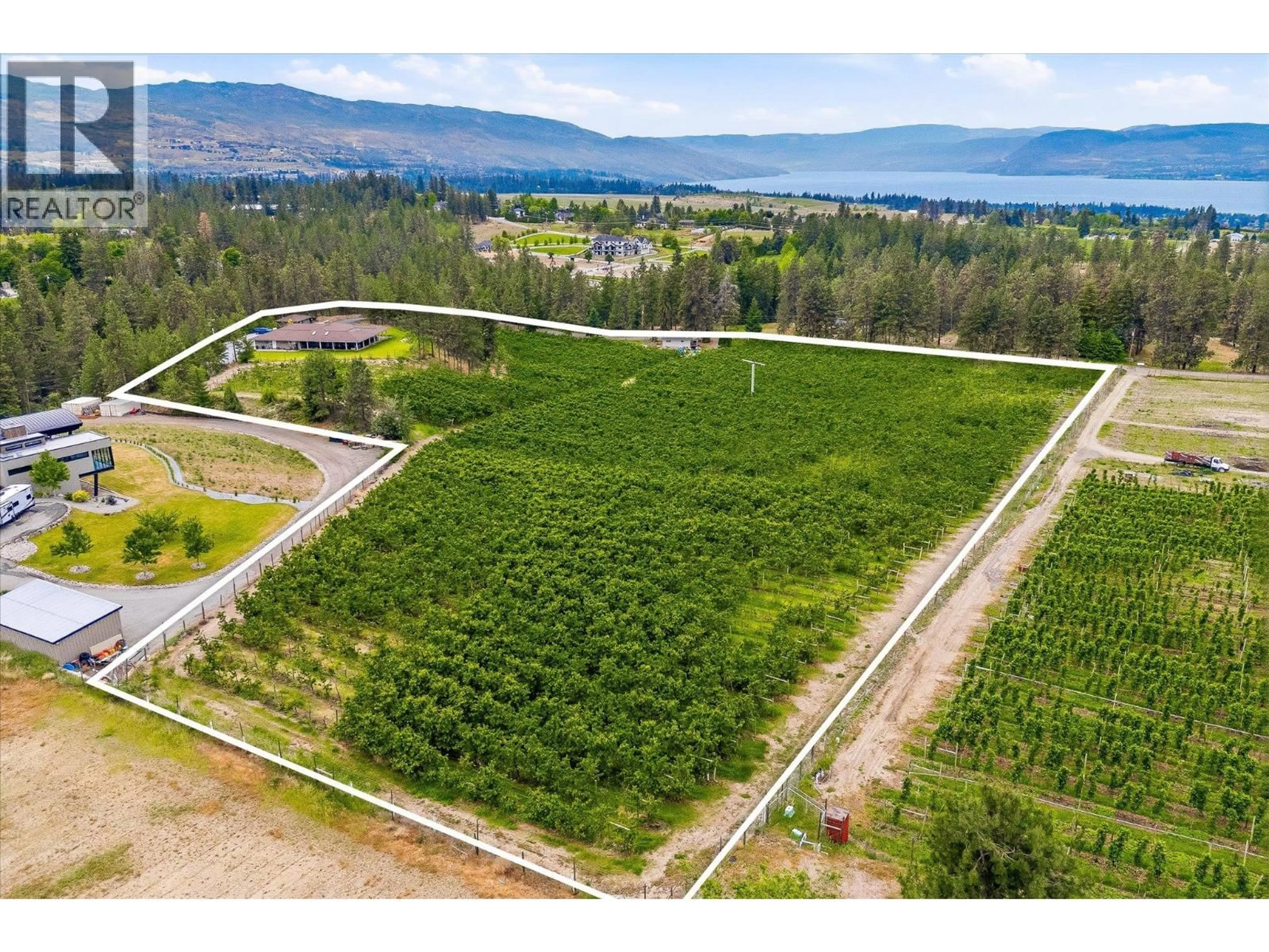 A pic from outside/outdoor area/front of a property/back of a property/a pic from drone, water/lake/river/ocean view for 4235 TODD ROAD, Kelowna British Columbia V1W4B8