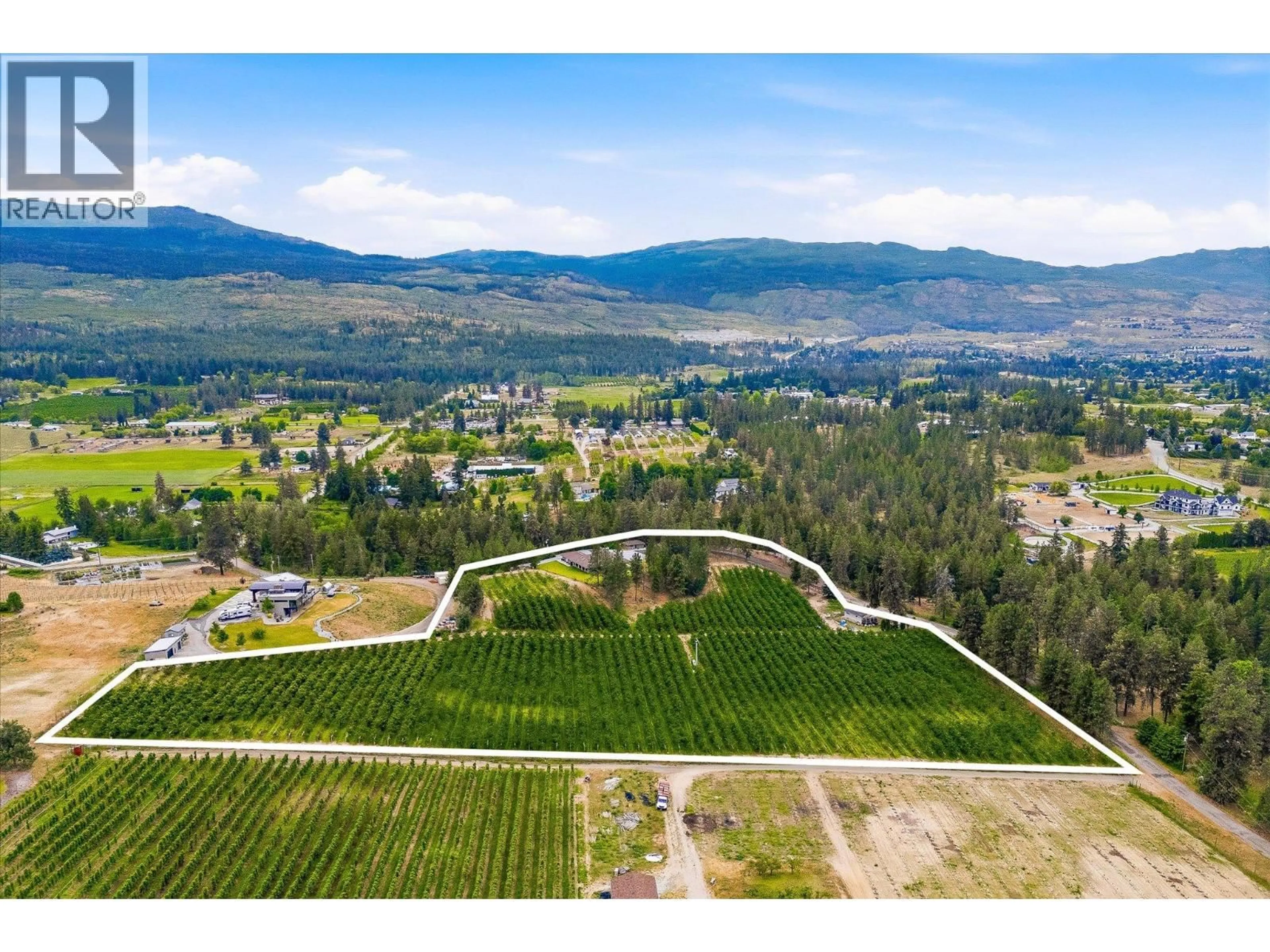 A pic from outside/outdoor area/front of a property/back of a property/a pic from drone, mountain view for 4235 TODD ROAD, Kelowna British Columbia V1W4B8