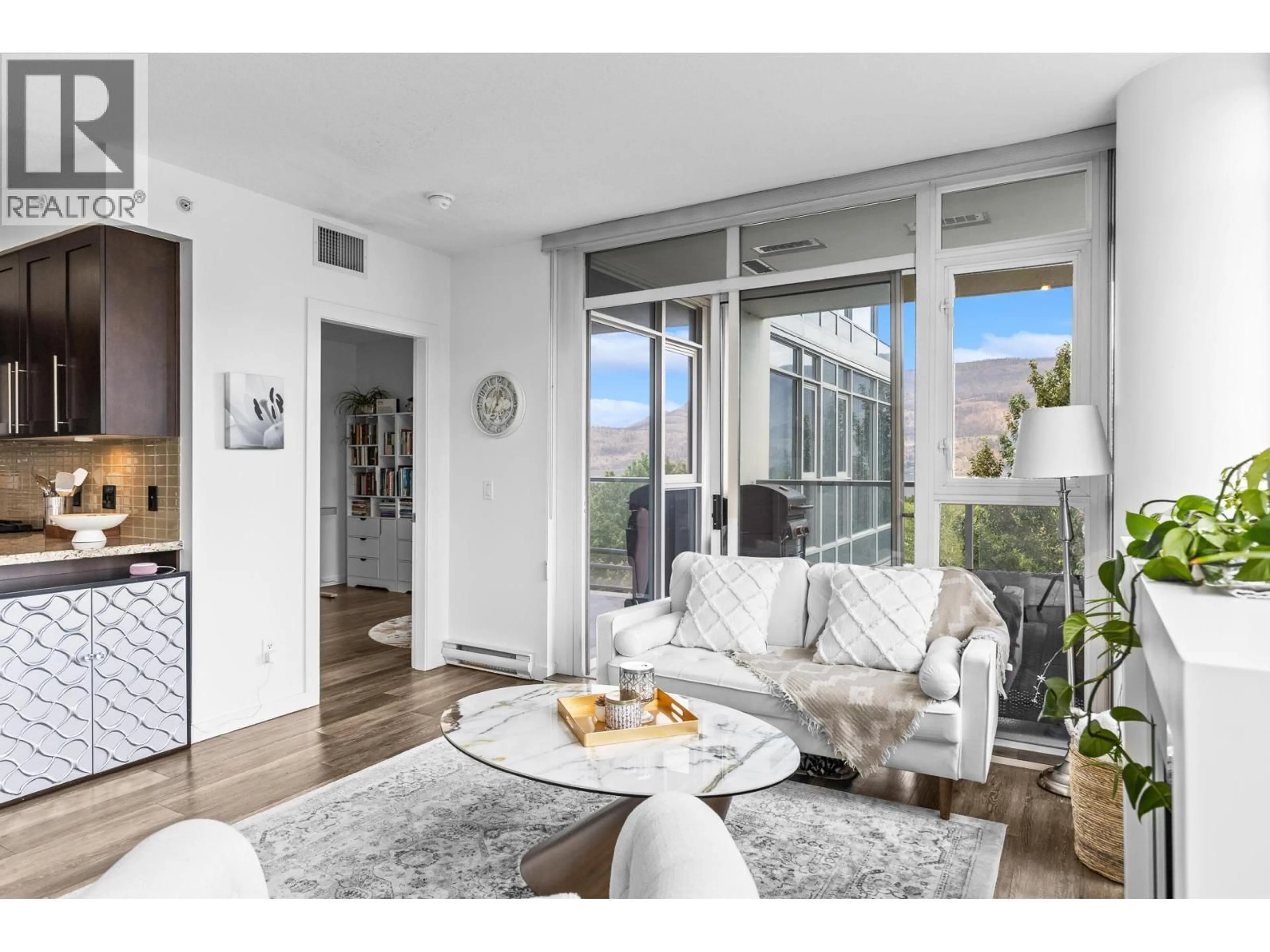 Living room with furniture, unknown for 702 - 1075 SUNSET DRIVE, Kelowna British Columbia V1Y9Y9