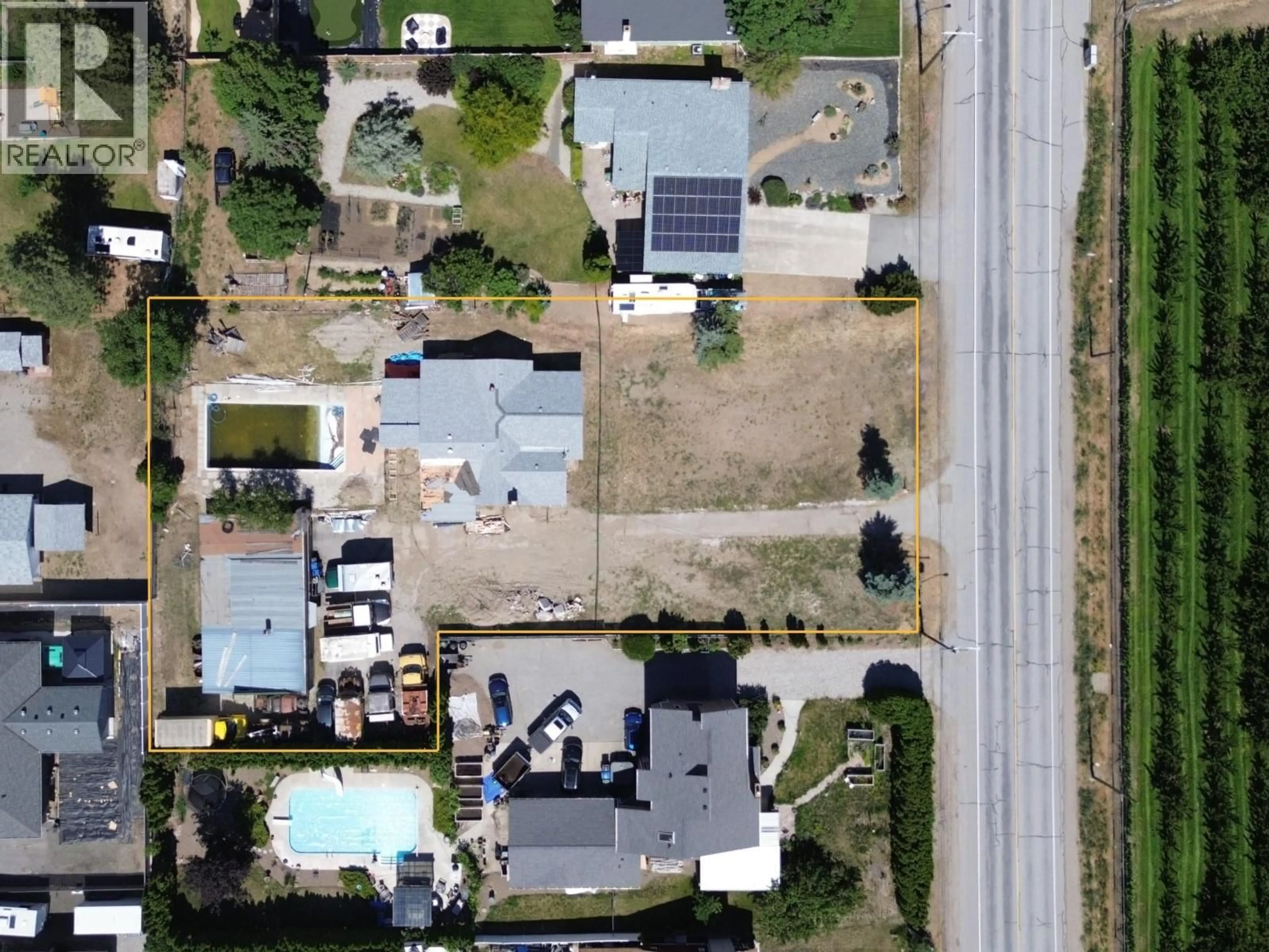 A pic from outside/outdoor area/front of a property/back of a property/a pic from drone, street for 1038 FAIRVIEW ROAD, Oliver British Columbia V0H1T1