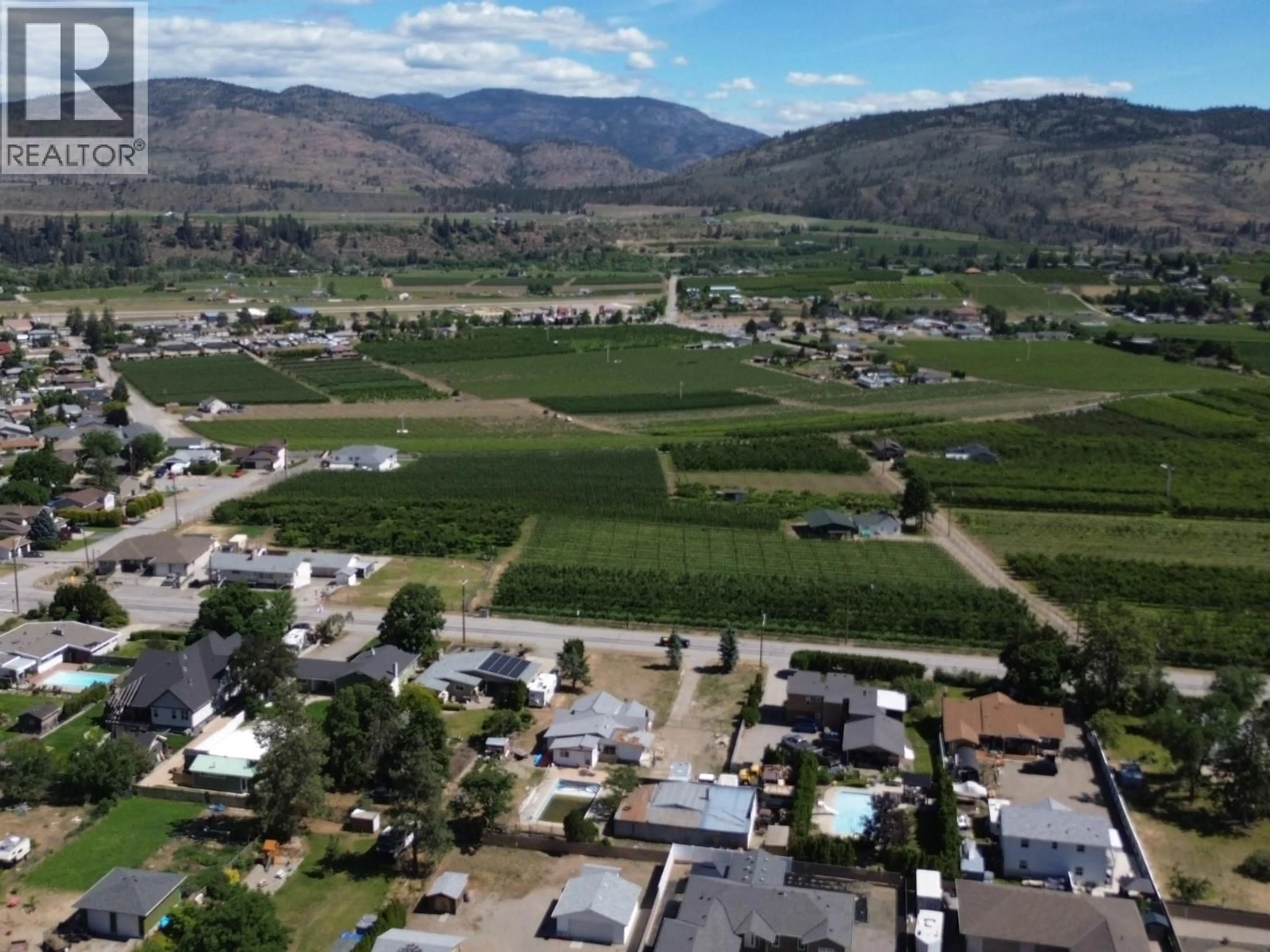 A pic from outside/outdoor area/front of a property/back of a property/a pic from drone, mountain view for 1038 FAIRVIEW ROAD, Oliver British Columbia V0H1T1