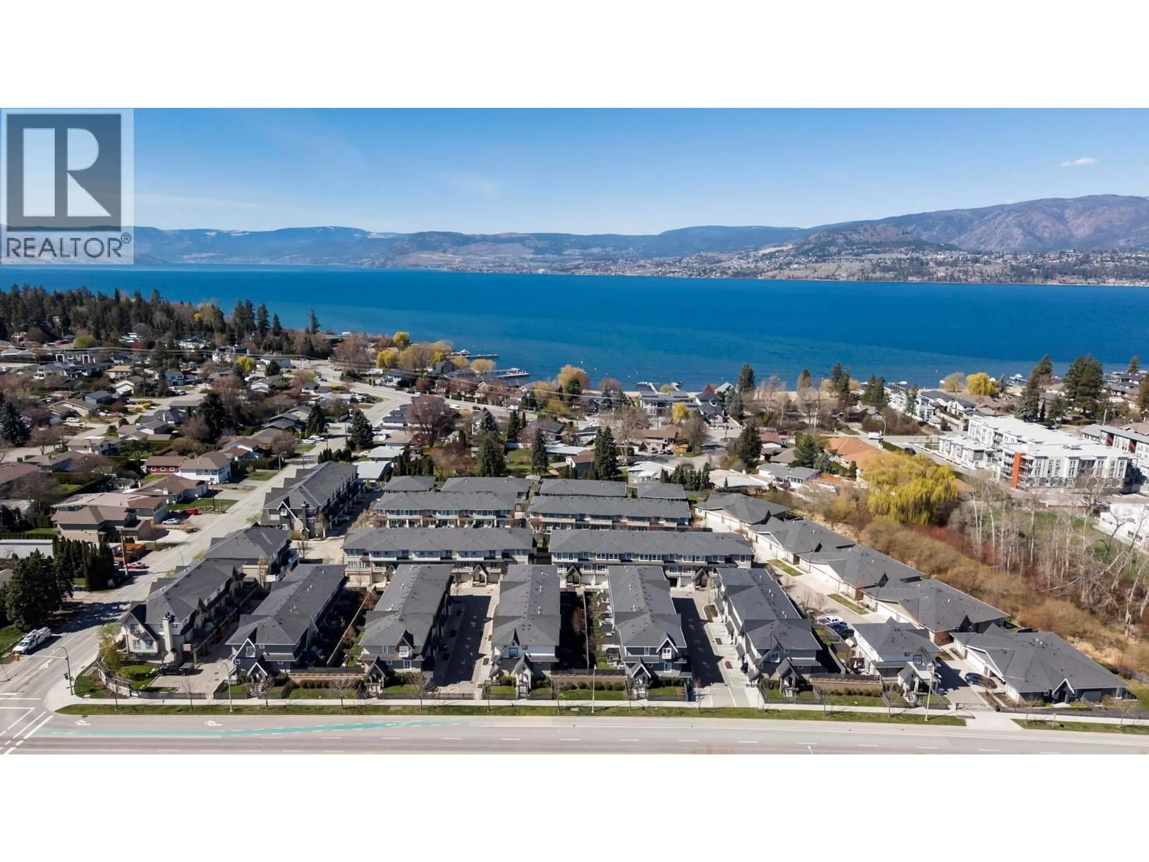A pic from outside/outdoor area/front of a property/back of a property/a pic from drone, water/lake/river/ocean view for 33 - 680 OLD MEADOWS ROAD, Kelowna British Columbia V1W5L4