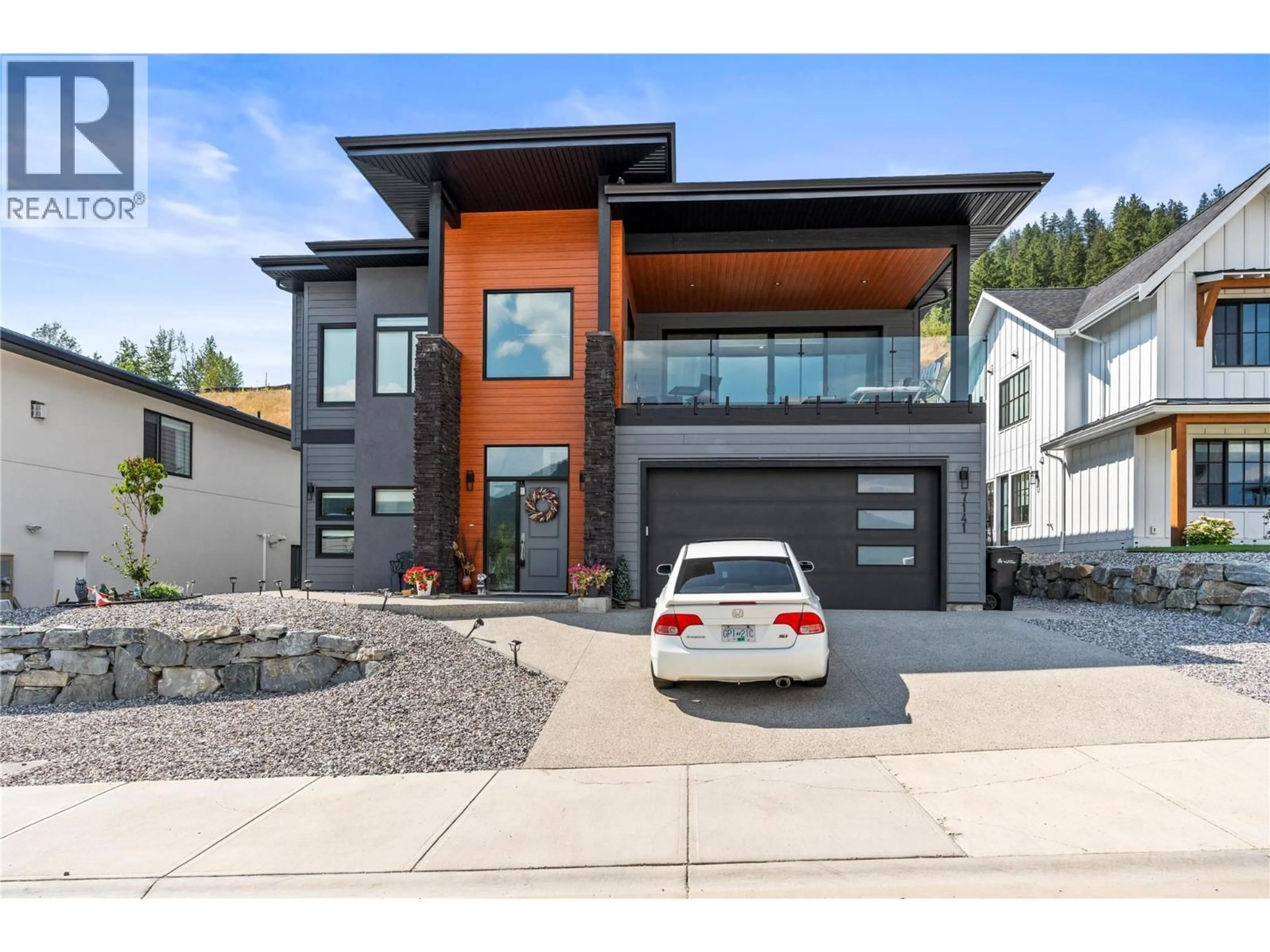 Home with brick exterior material, street for 7141 NAKISKA DRIVE, Vernon British Columbia V1B3M5
