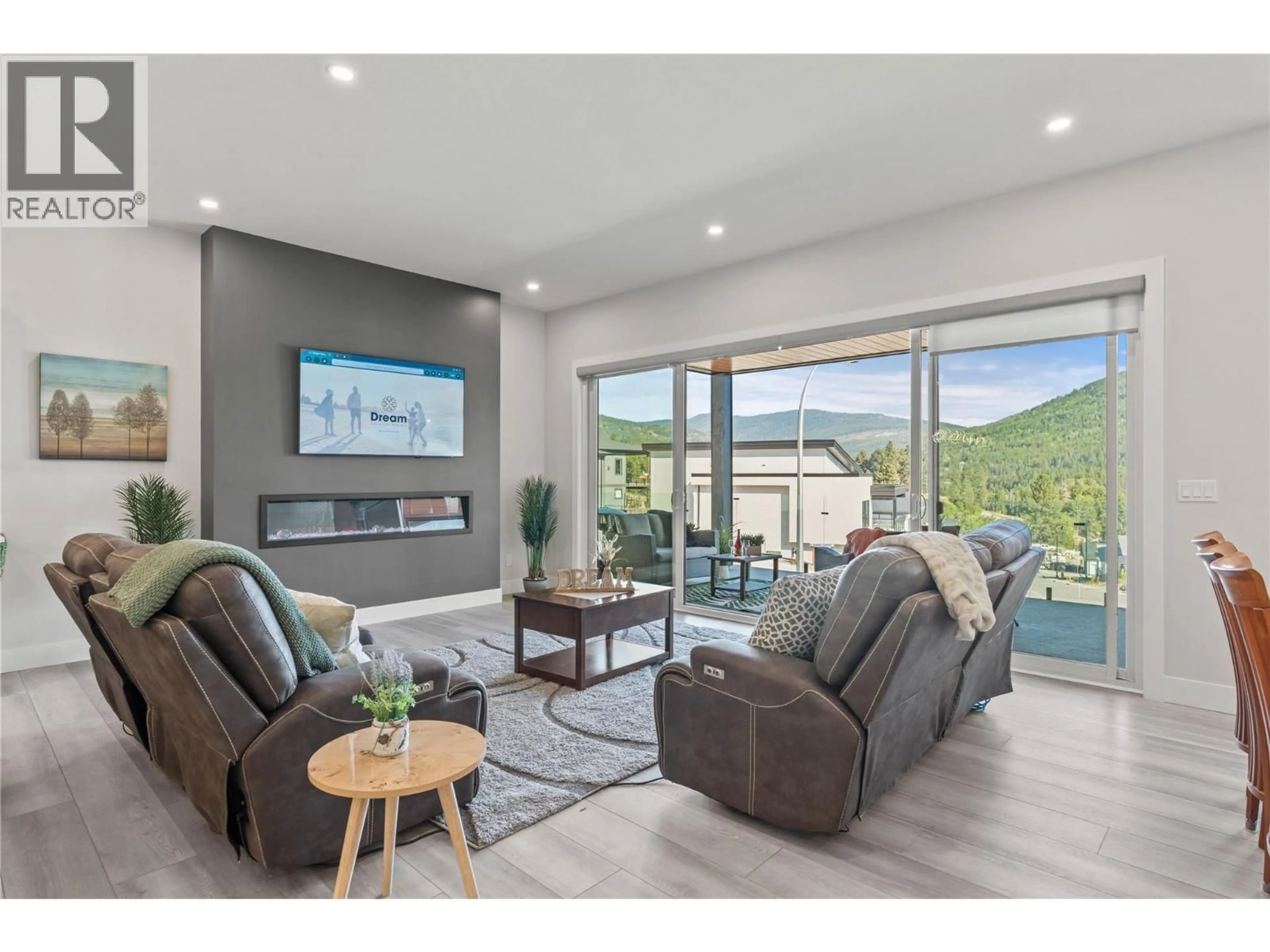 Living room with furniture, unknown for 7141 NAKISKA DRIVE, Vernon British Columbia V1B3M5