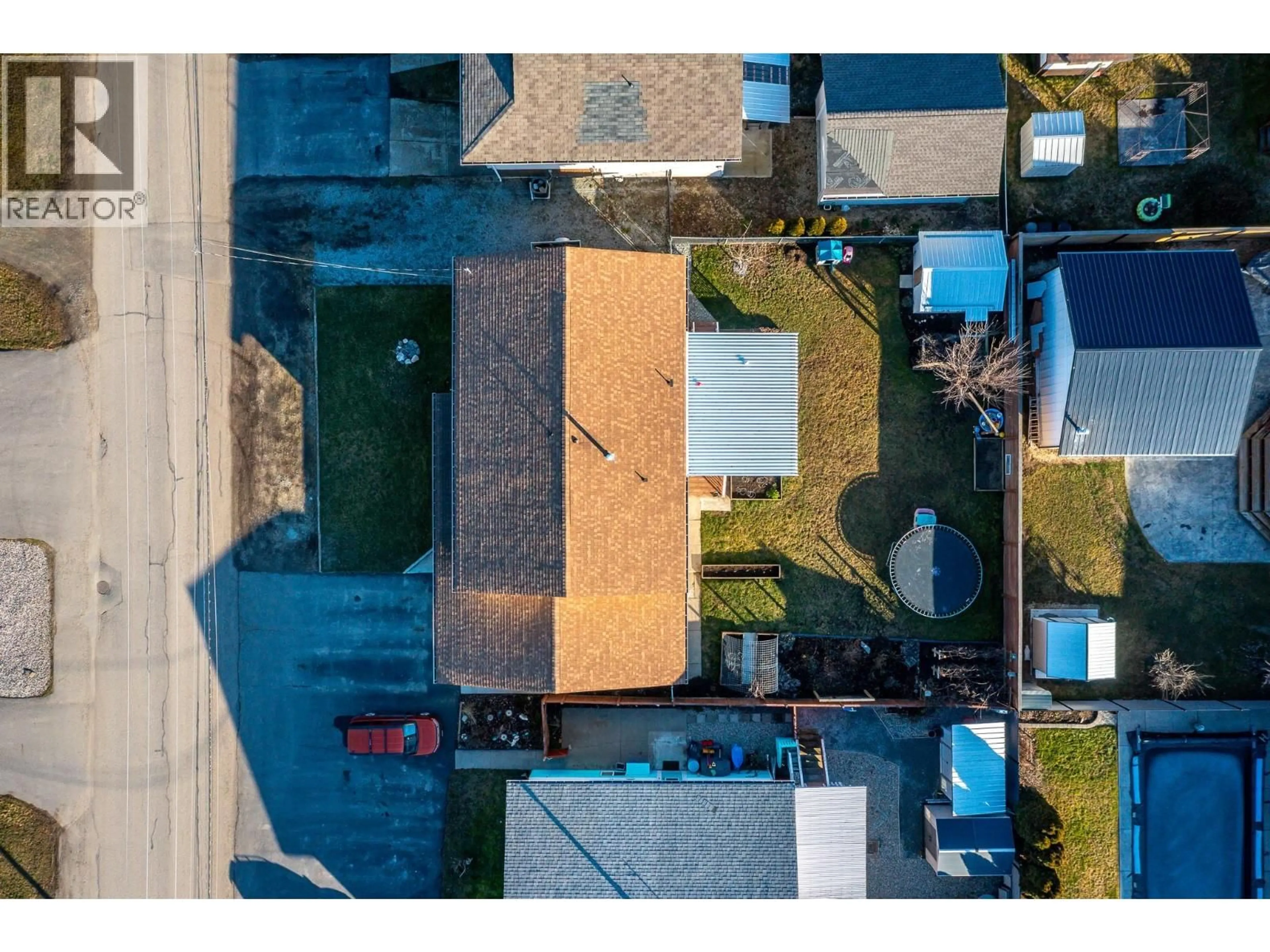 A pic from outside/outdoor area/front of a property/back of a property/a pic from drone, street for 302 BASS AVENUE, Enderby British Columbia V0E1V2