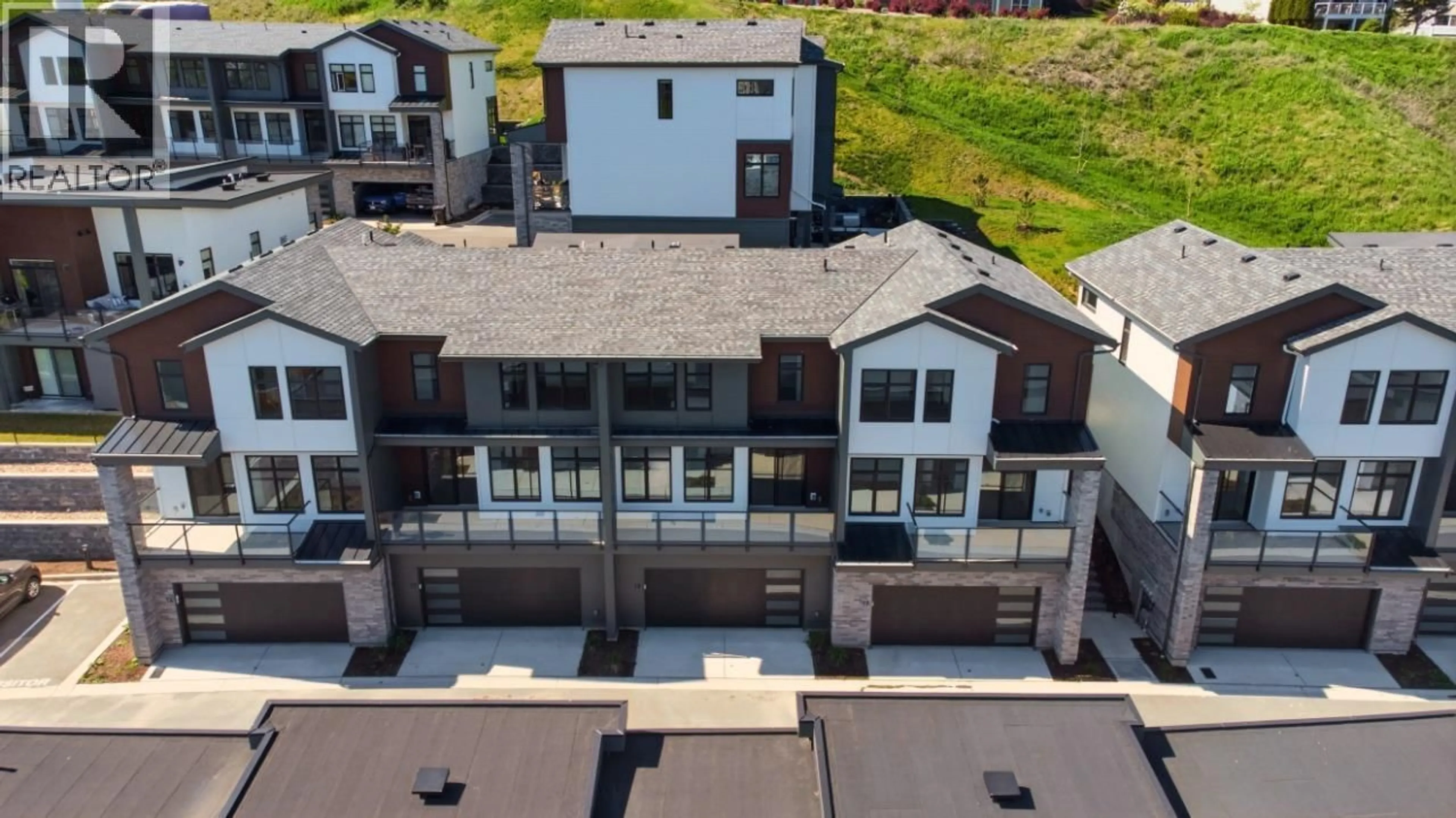 A pic from outside/outdoor area/front of a property/back of a property/a pic from drone, mountain view for 18 - 7599 KLINGER ROAD, Okanagan Landing British Columbia V1H0B2