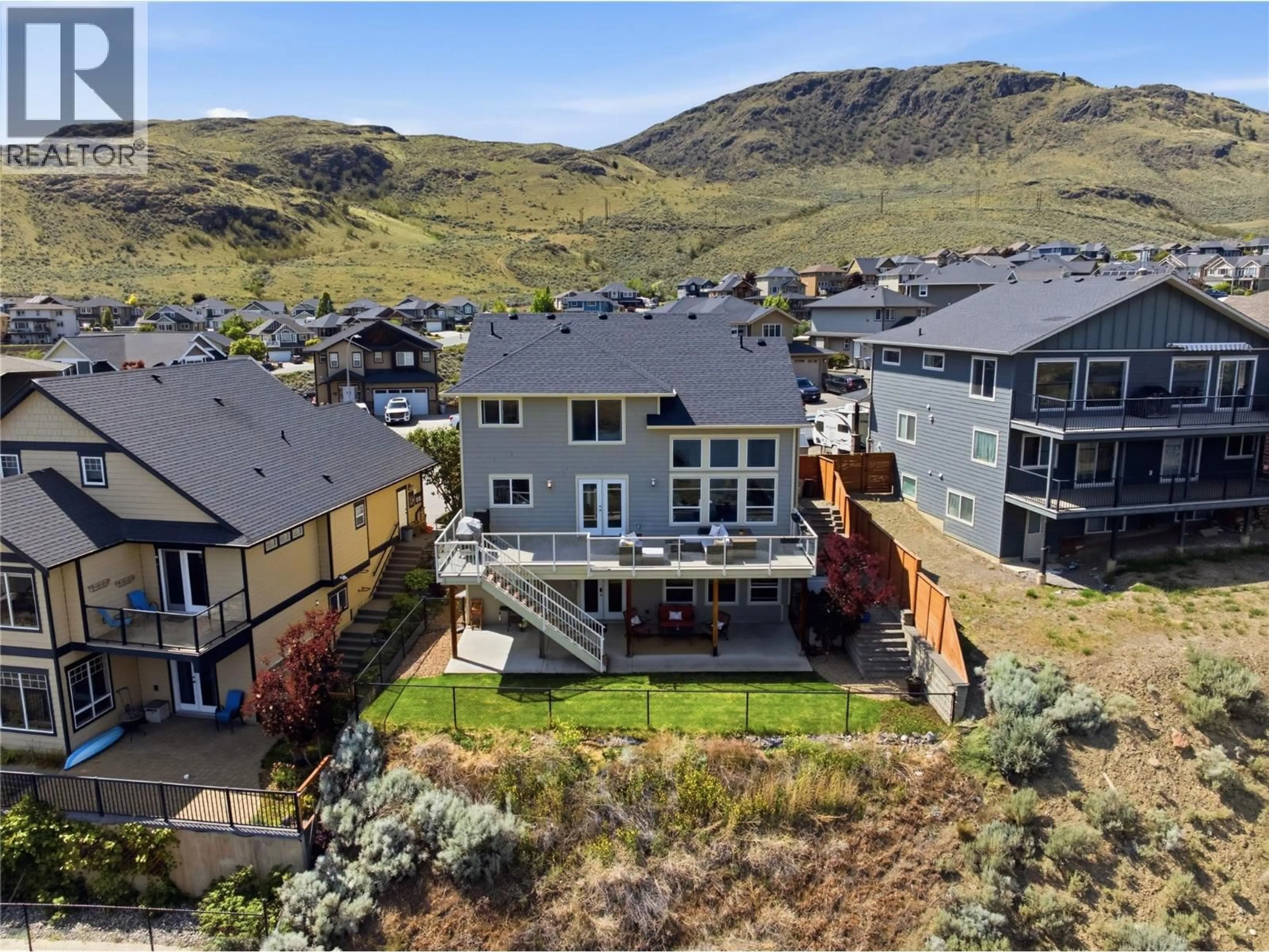 A pic from outside/outdoor area/front of a property/back of a property/a pic from drone, mountain view for 1014 SADDLEBACK COURT, Kamloops British Columbia V2B0B9