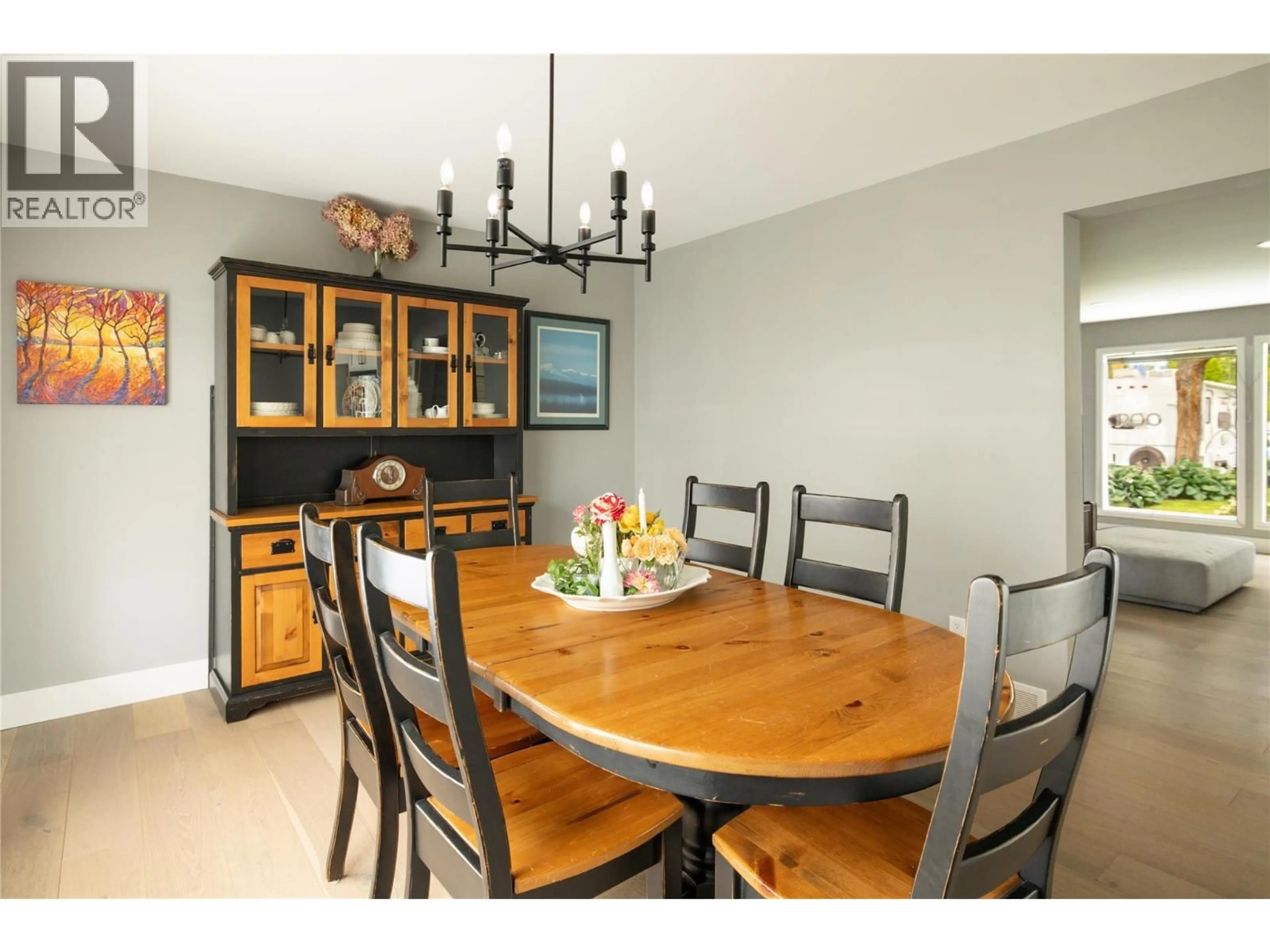 Dining room, wood/laminate floor for 3450 BARBERRY STREET, Kelowna British Columbia V1W3V6