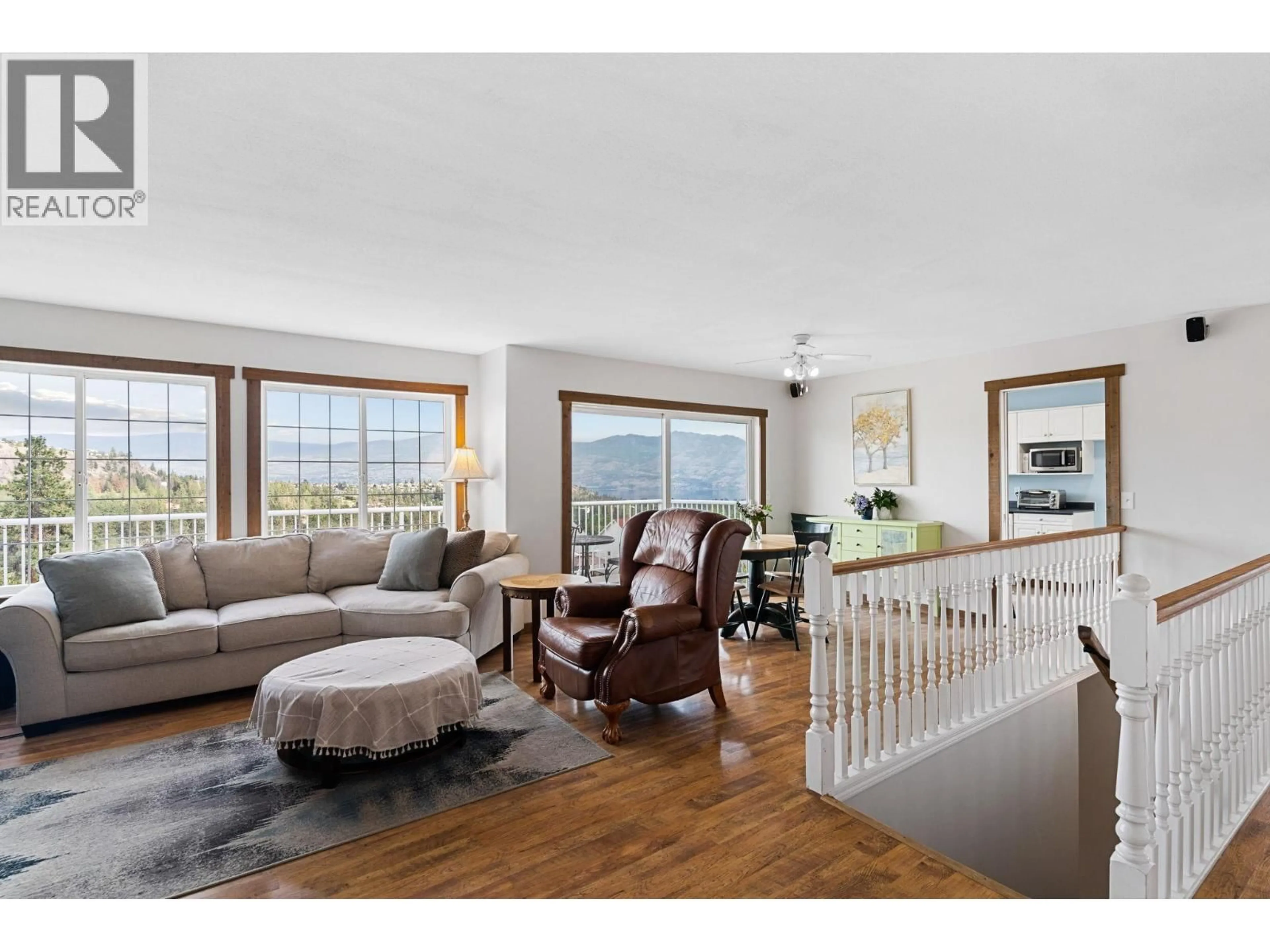 Living room with furniture, wood/laminate floor for 3052 ENSIGN WAY, West Kelowna British Columbia V4T1V1