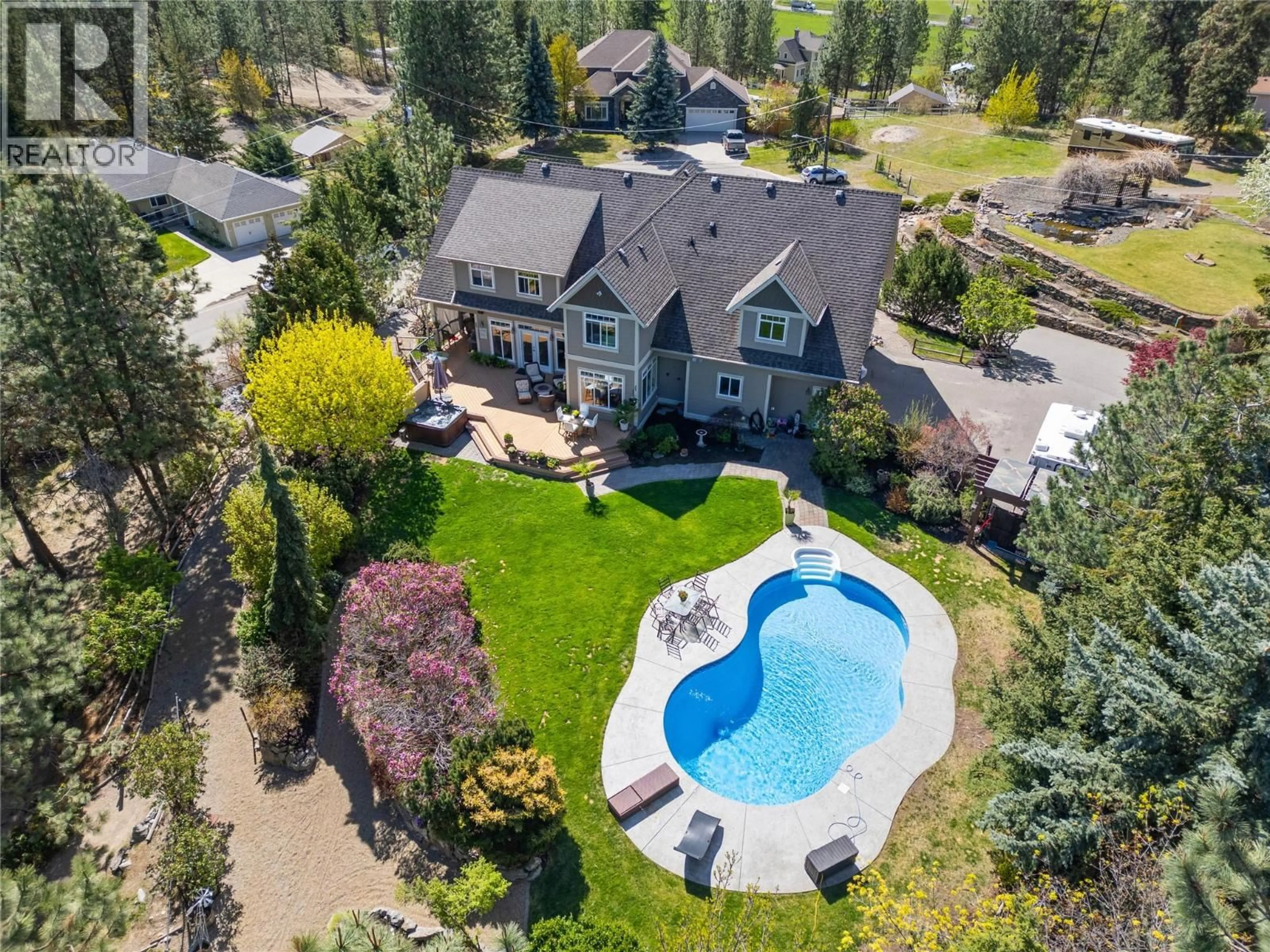 A pic from outside/outdoor area/front of a property/back of a property/a pic from drone, unknown for 4140 SEDDON ROAD, Kelowna British Columbia V1W4C9