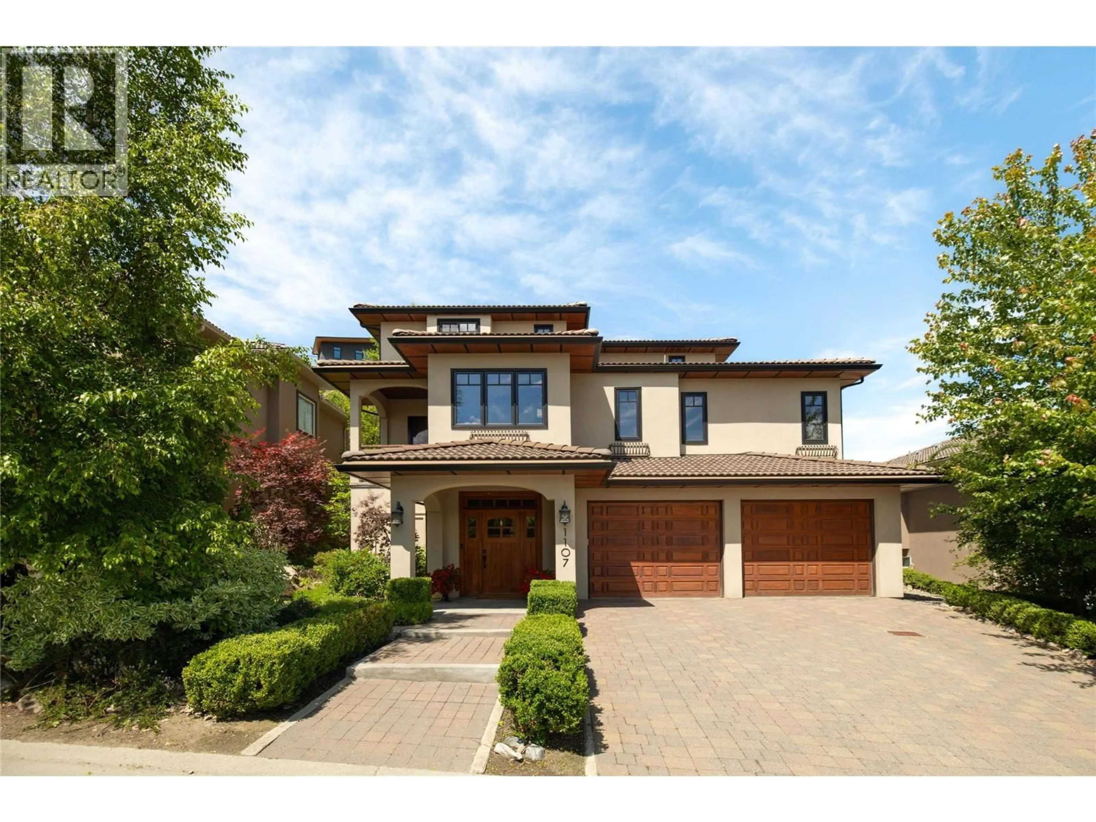 Home with brick exterior material, street for 1107 HENDERSON DRIVE, Kelowna British Columbia V1P1L8