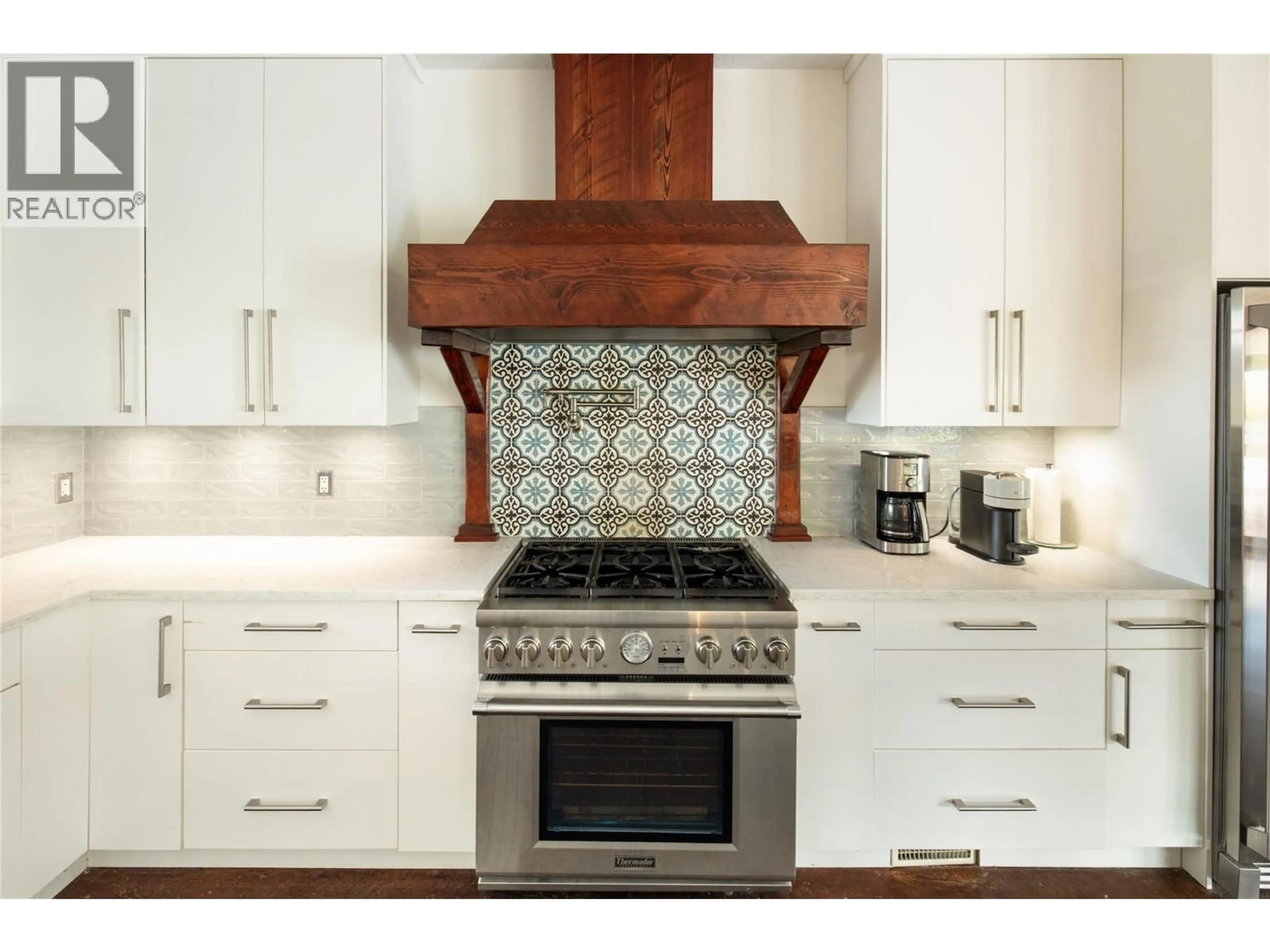 Contemporary kitchen, ceramic/tile floor for 1107 HENDERSON DRIVE, Kelowna British Columbia V1P1L8