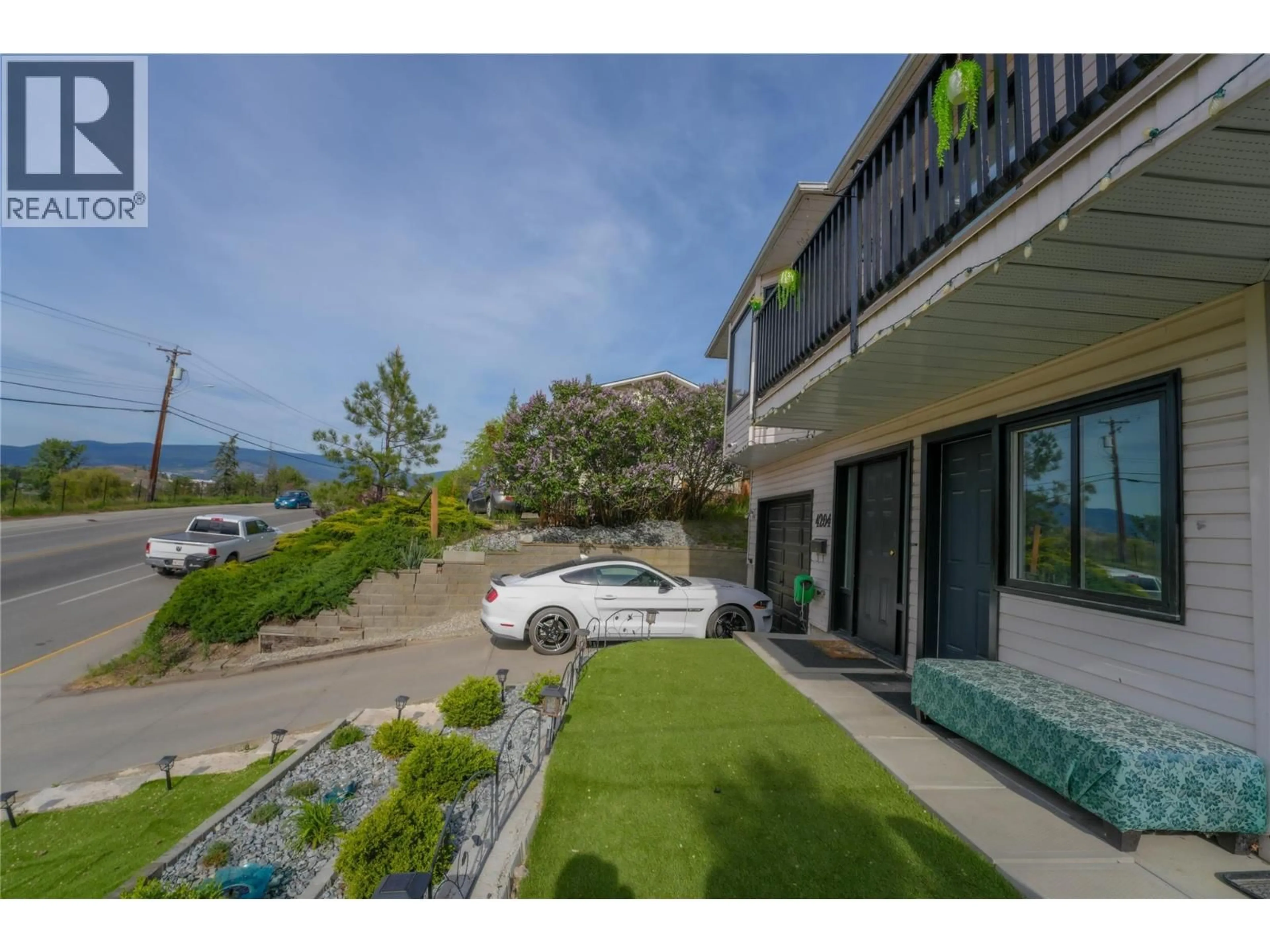 A pic from outside/outdoor area/front of a property/back of a property/a pic from drone, water/lake/river/ocean view for 4204 OKANAGAN AVENUE, Vernon British Columbia V1T8R4