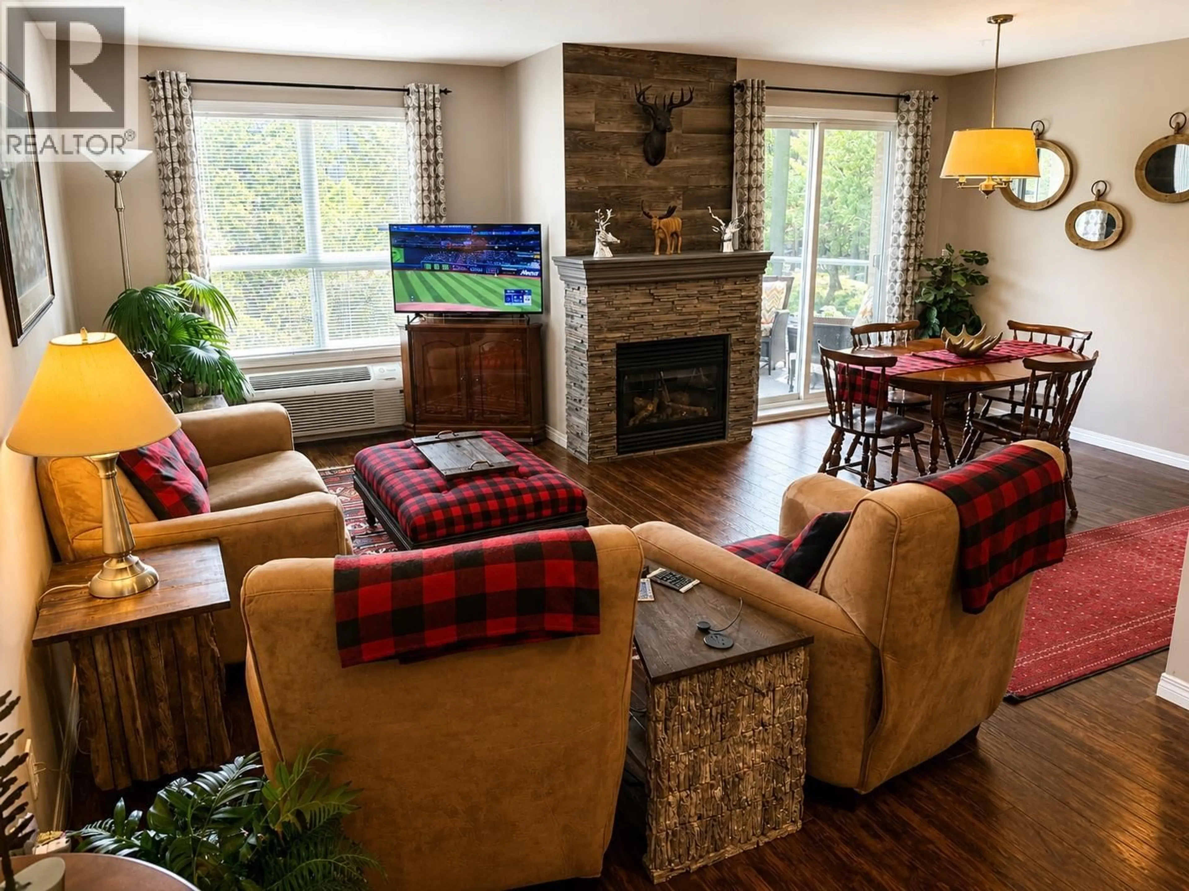 Living room with furniture, wood/laminate floor for 201 - 4765 FORSTERS LANDING ROAD, Radium Hot Springs British Columbia V0A1M0