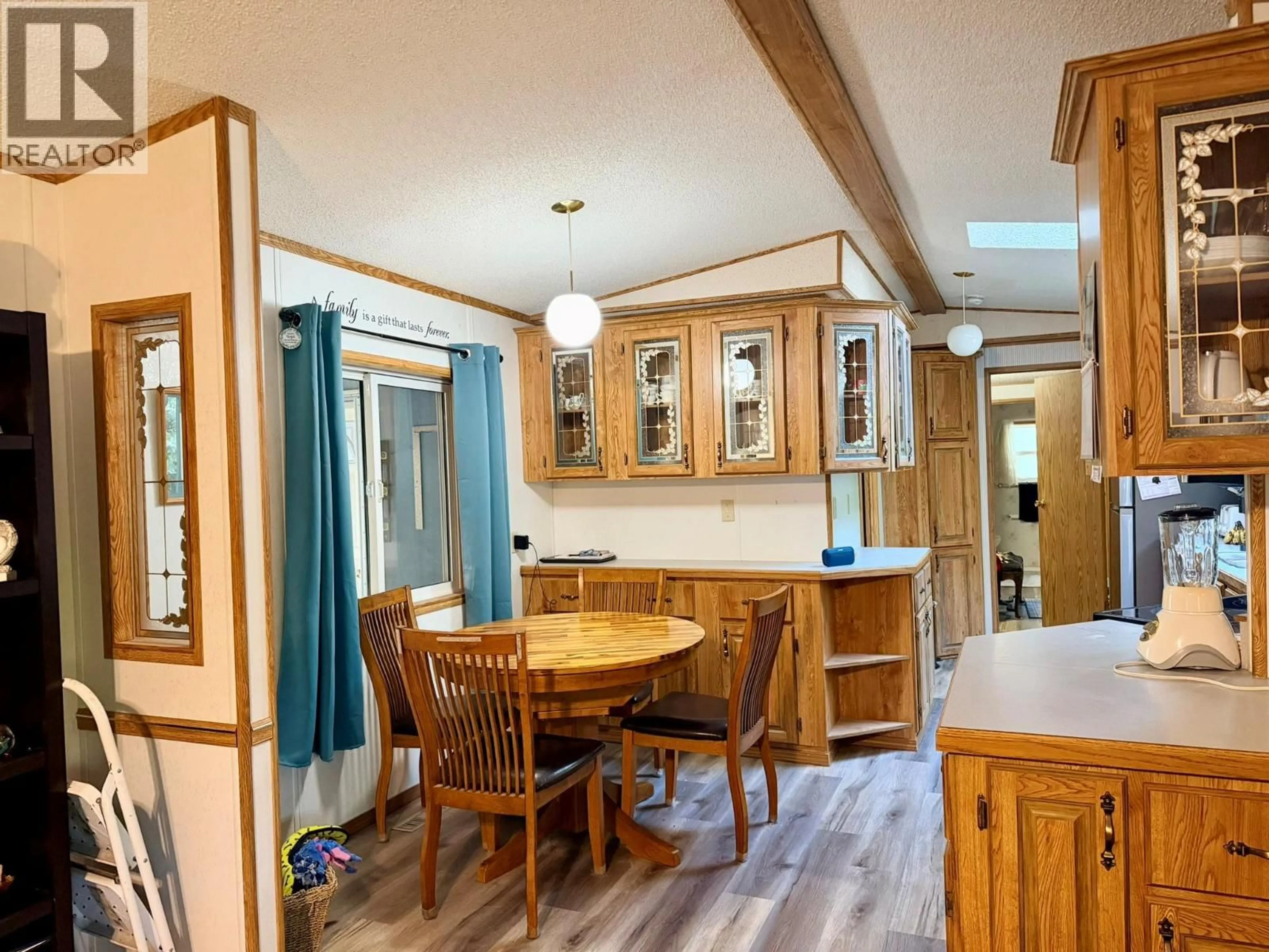 Open concept kitchen, wood/laminate floor for 20 - 1436 NORTH WEST BOULEVARD, Creston British Columbia V0B1G6