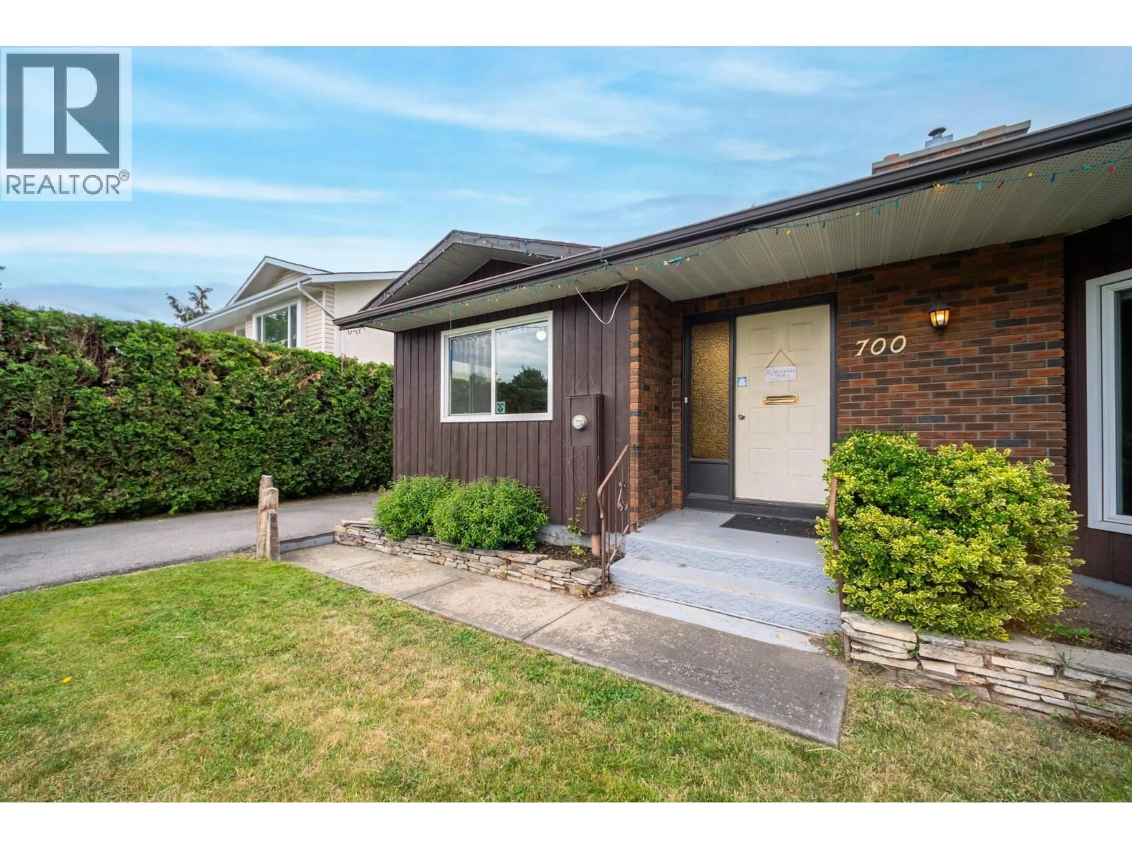 Home with brick exterior material, street for 700 RICHARDS ROAD, Kelowna British Columbia V1X2X6