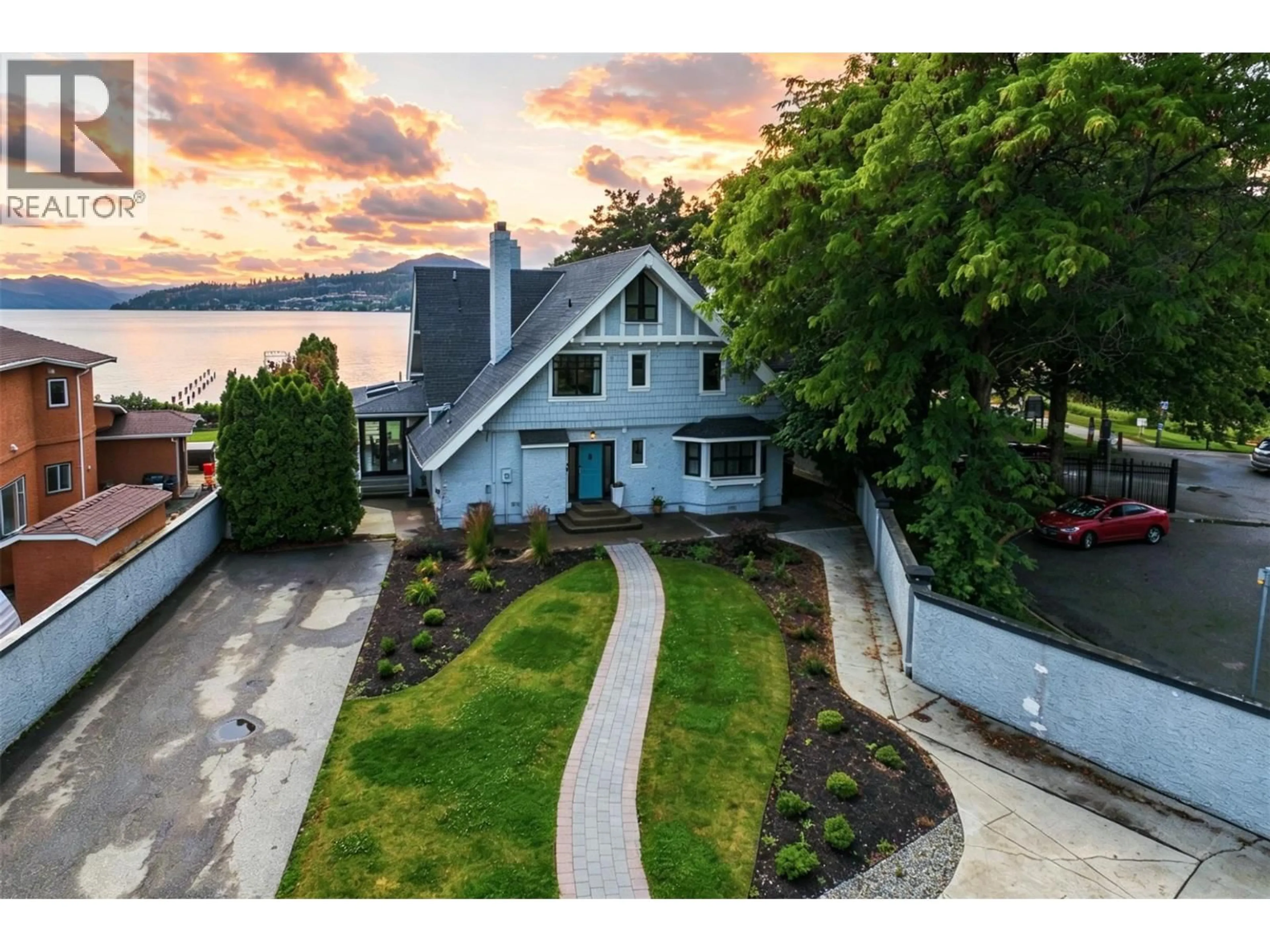 A pic from outside/outdoor area/front of a property/back of a property/a pic from drone, water/lake/river/ocean view for 124 MCTAVISH AVENUE, Kelowna British Columbia V1Y5W3