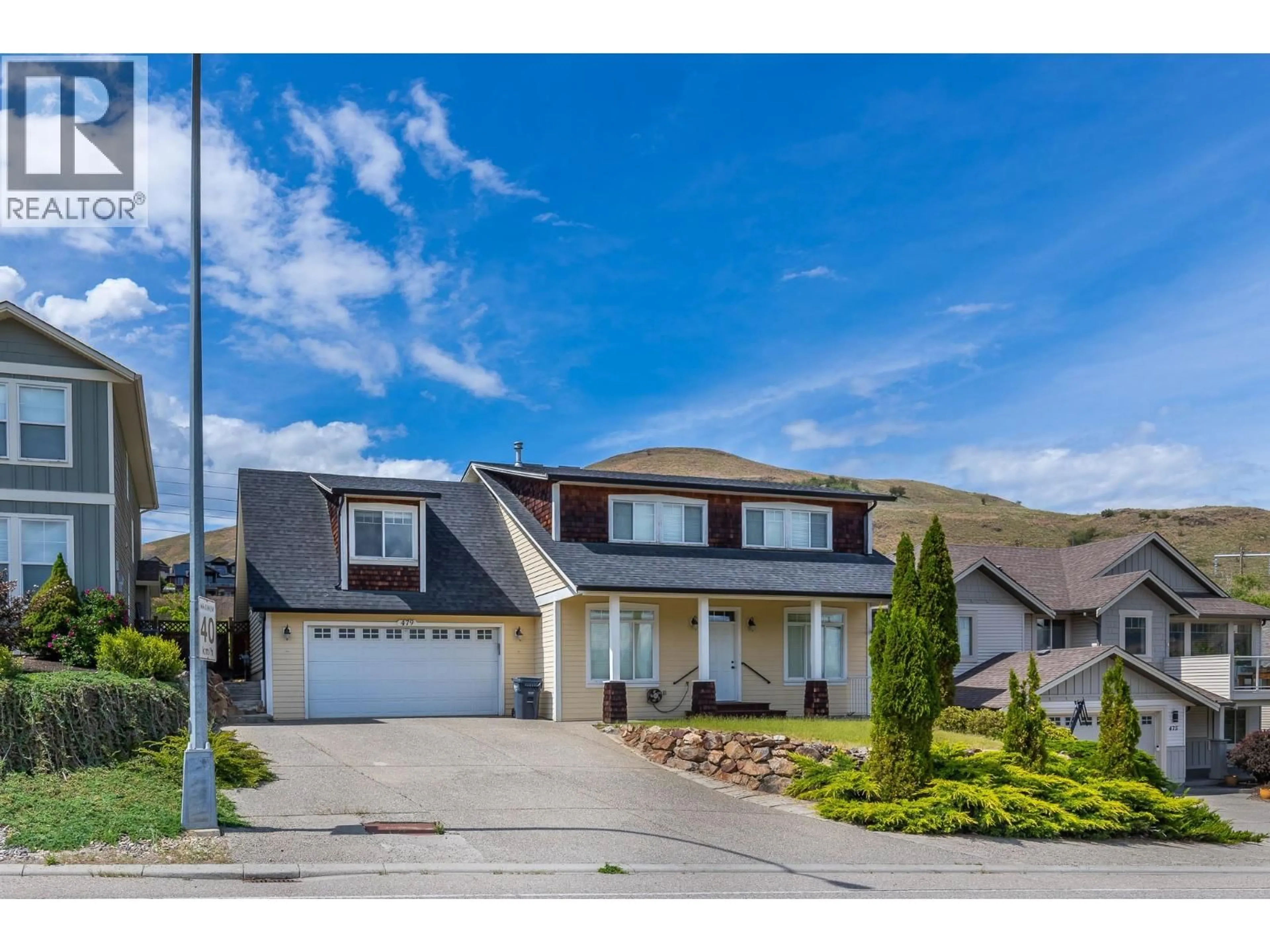 Home with vinyl exterior material, street for 479 MIDDLETON WAY, Coldstream British Columbia V1B3Z7
