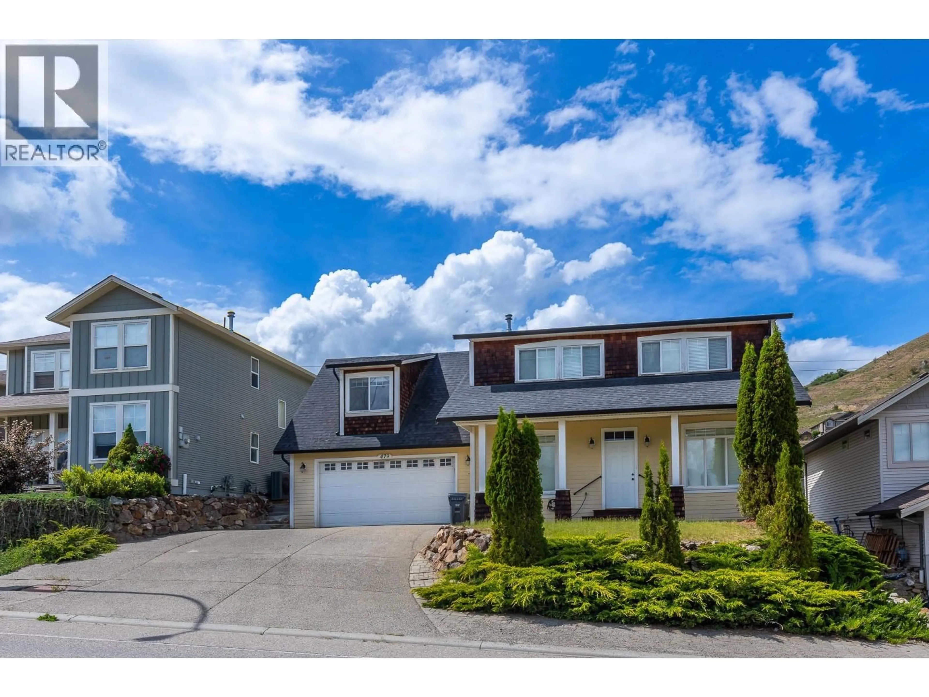 Home with vinyl exterior material, street for 479 MIDDLETON WAY, Coldstream British Columbia V1B3Z7