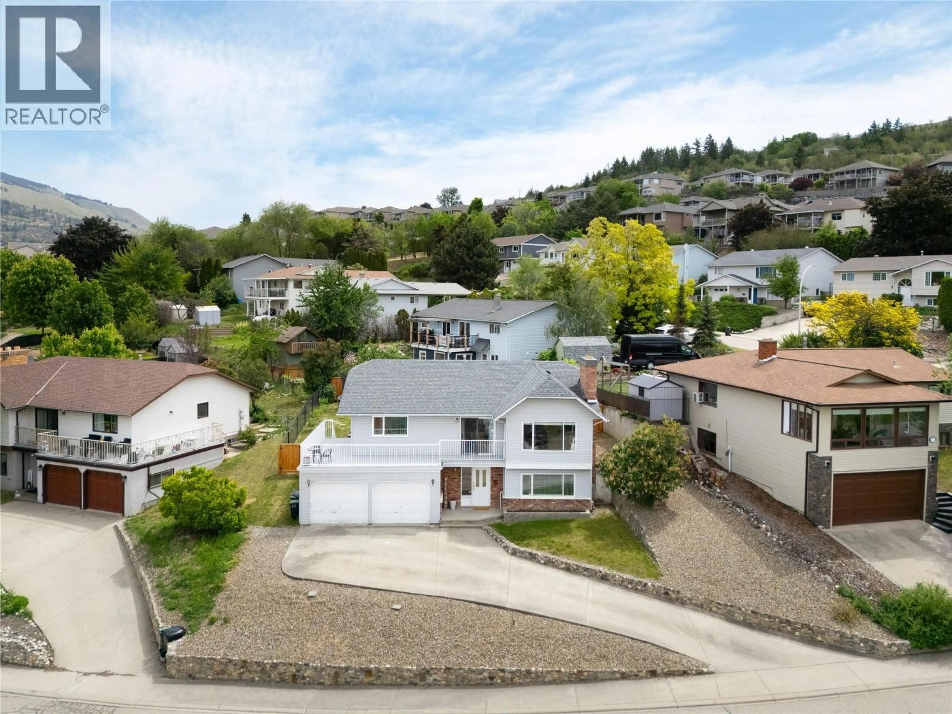 A pic from outside/outdoor area/front of a property/back of a property/a pic from drone, street for 1078 MT. BALDUR DRIVE, Vernon British Columbia V1B2N7