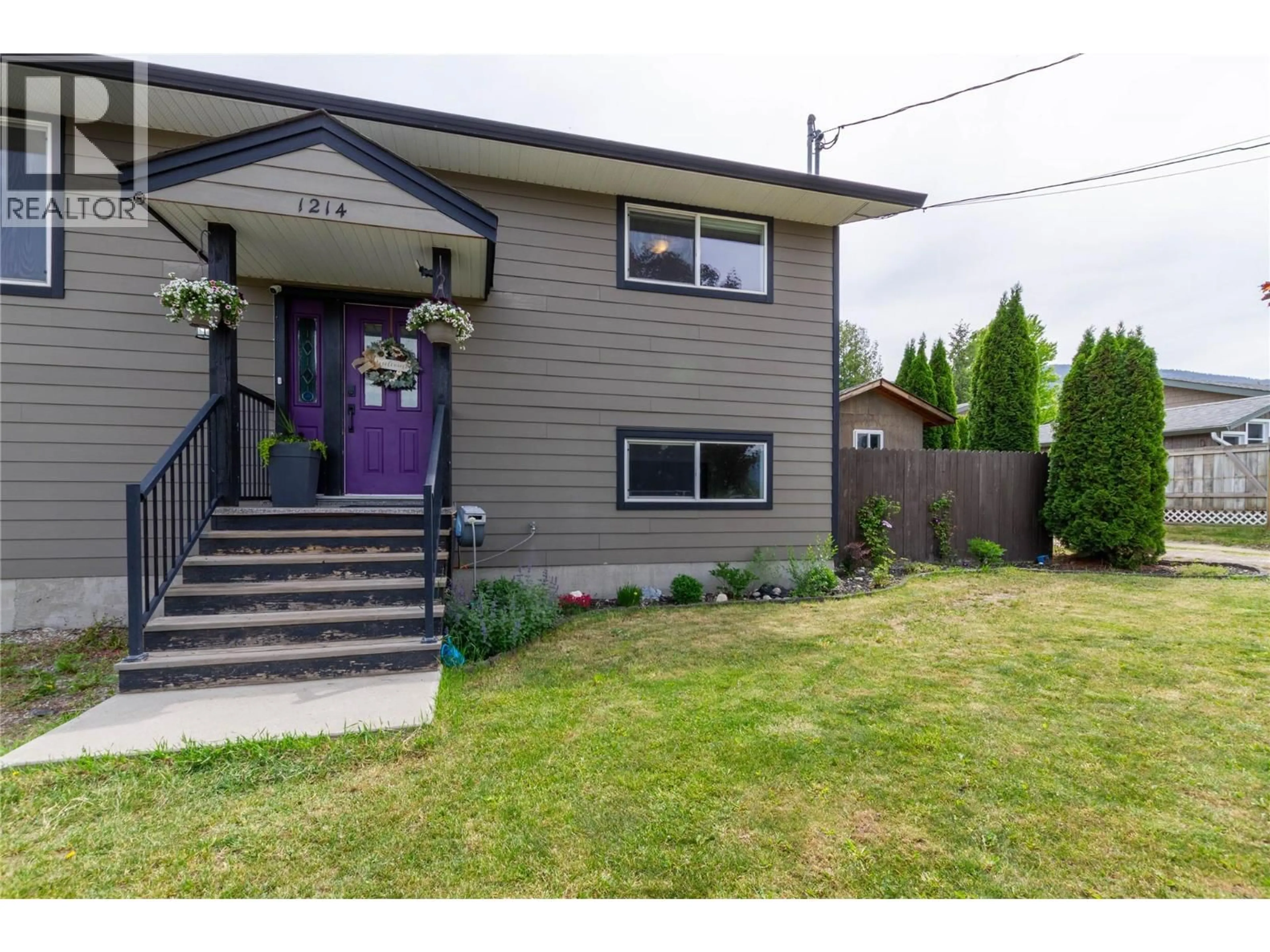 Home with vinyl exterior material, street for 1214 OTTER LAKE CROSS ROAD, Spallumcheen British Columbia V4Y0N8