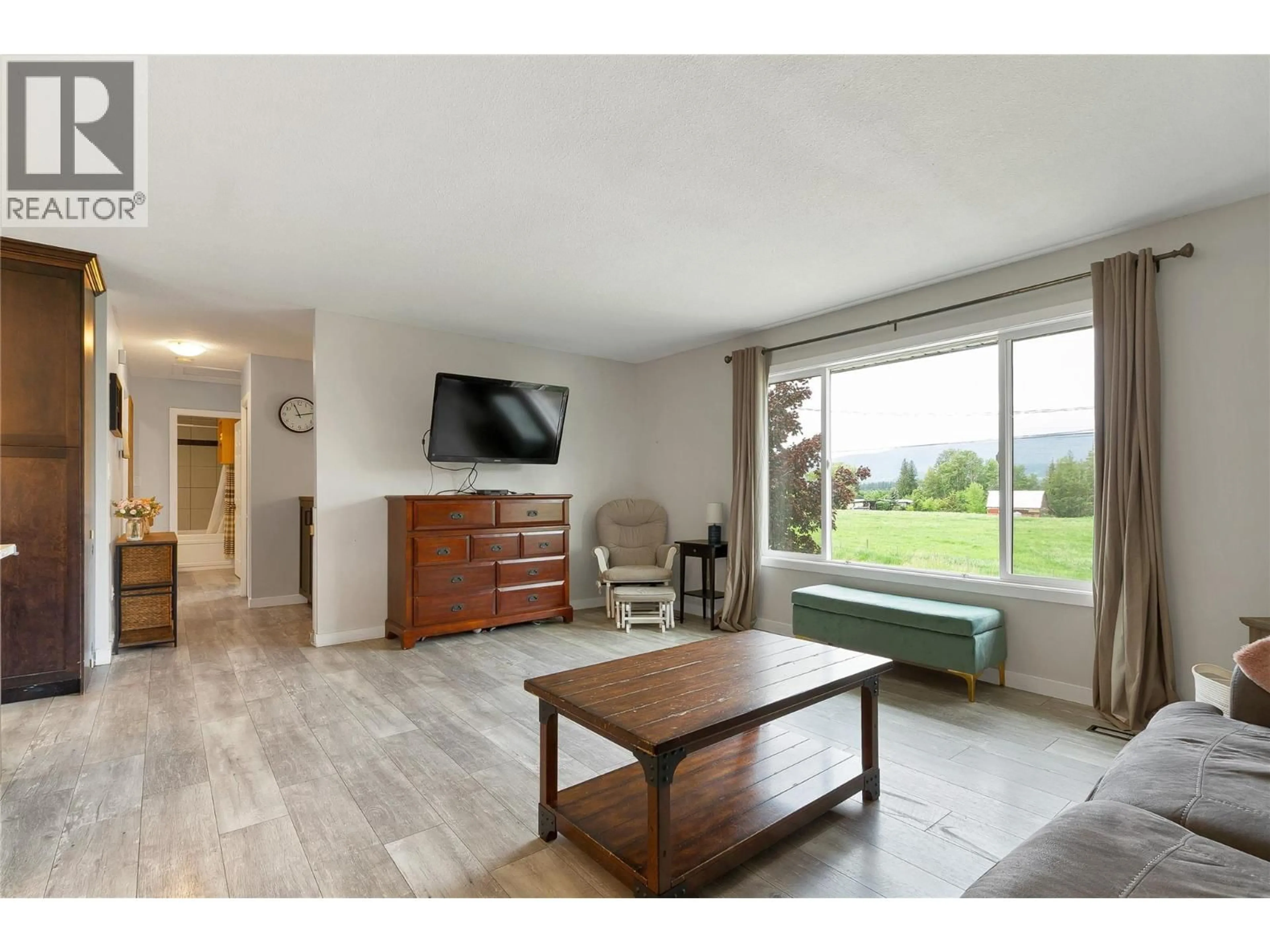 Living room with furniture, unknown for 1214 OTTER LAKE CROSS ROAD, Spallumcheen British Columbia V4Y0N8