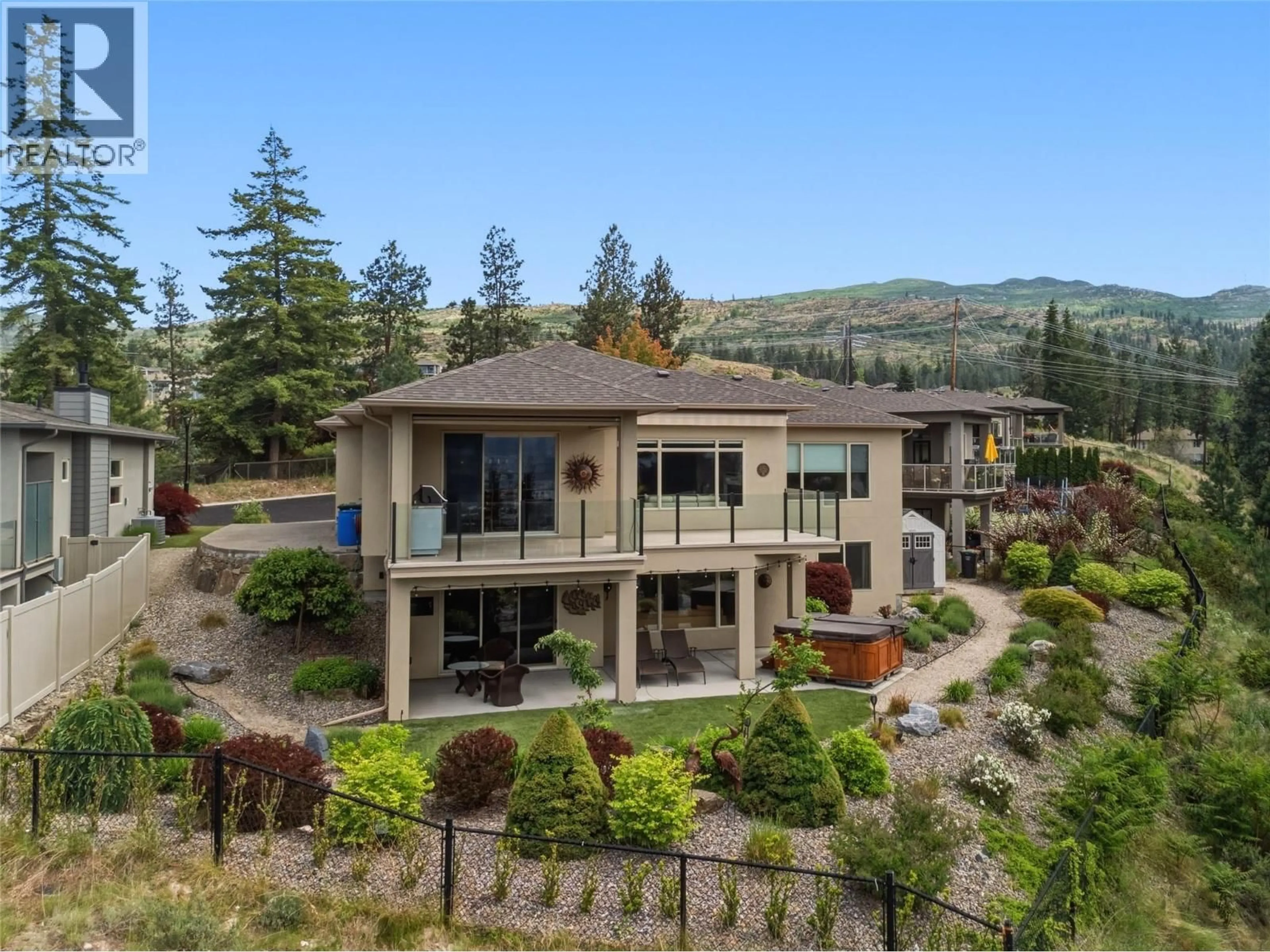 A pic from outside/outdoor area/front of a property/back of a property/a pic from drone, mountain view for 5 - 514 QUARTZ CRESCENT, Kelowna British Columbia V1W5C5