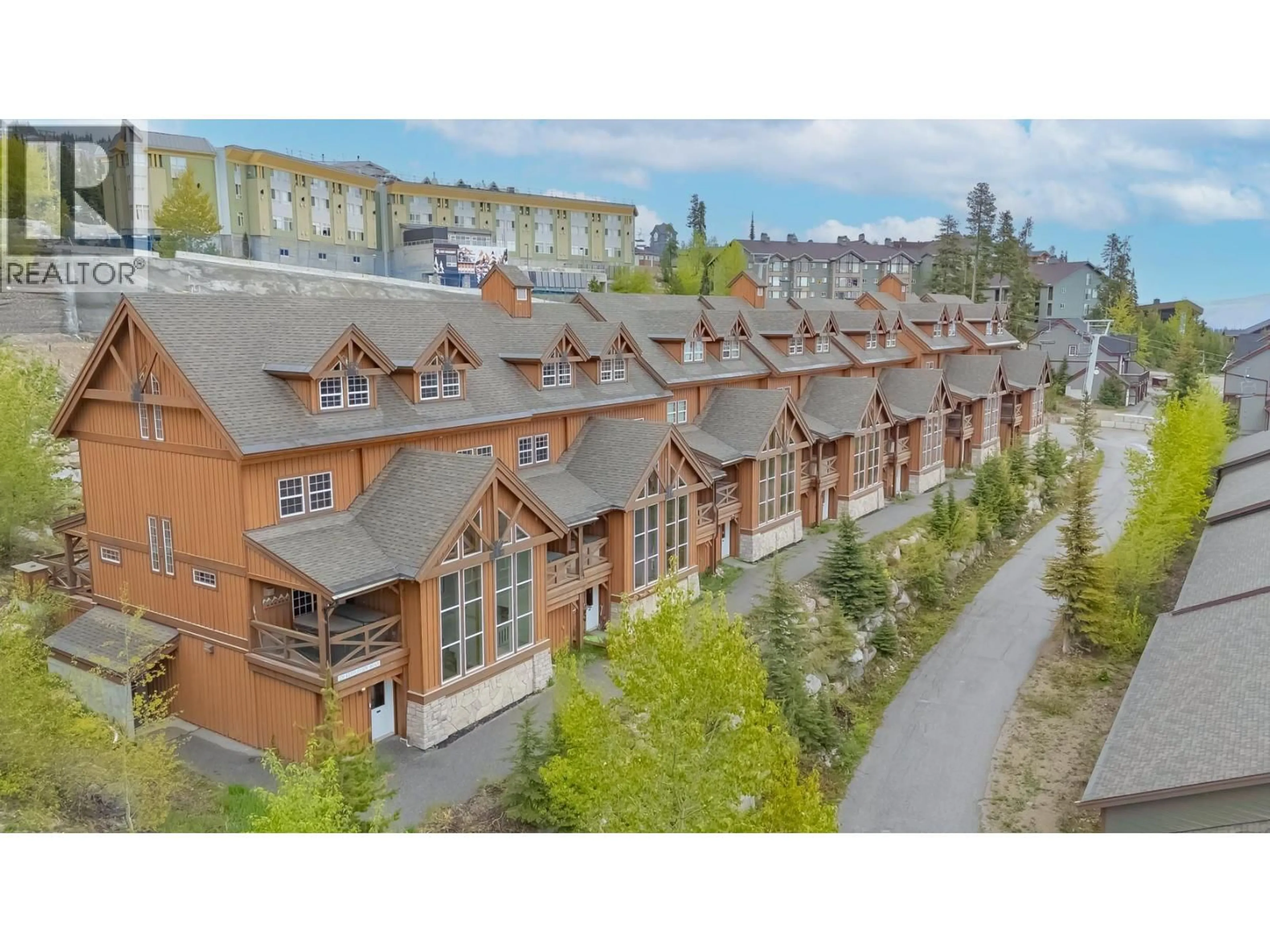 A pic from outside/outdoor area/front of a property/back of a property/a pic from drone, unknown for 14 - 220 KETTLEVIEW ROAD, Big White British Columbia V1P1P3