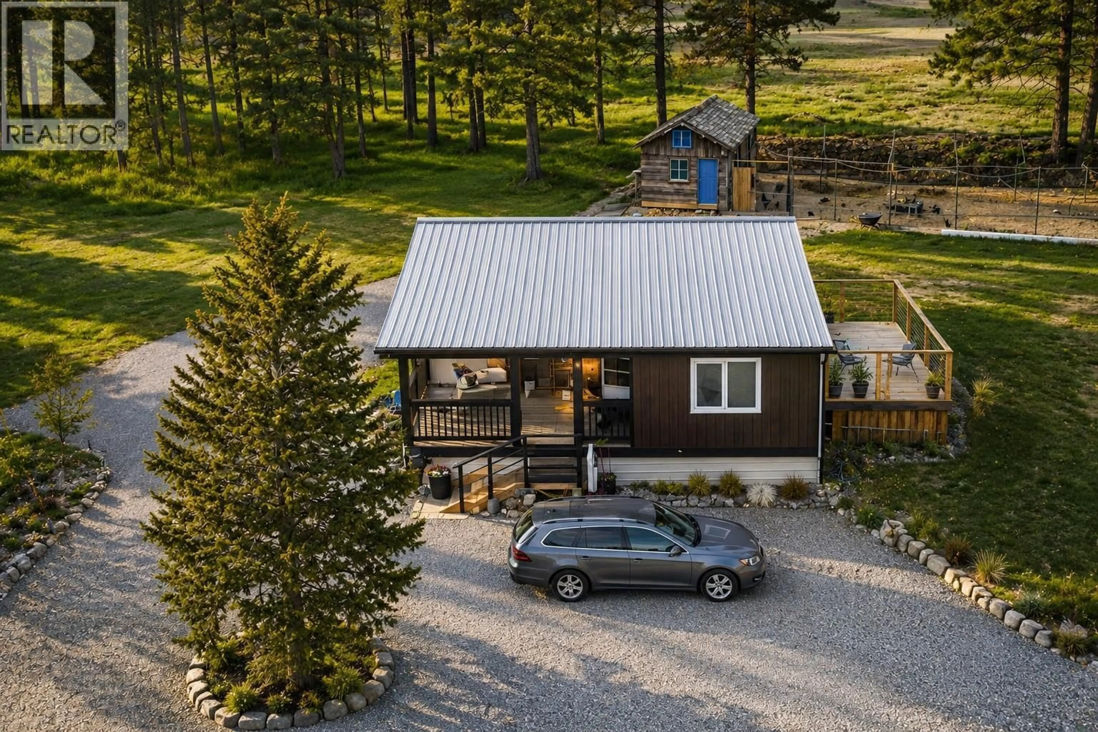 A pic from outside/outdoor area/front of a property/back of a property/a pic from drone, unknown for 5553 93/95 HIGHWAY, Ta Ta Creek British Columbia V0B2E0