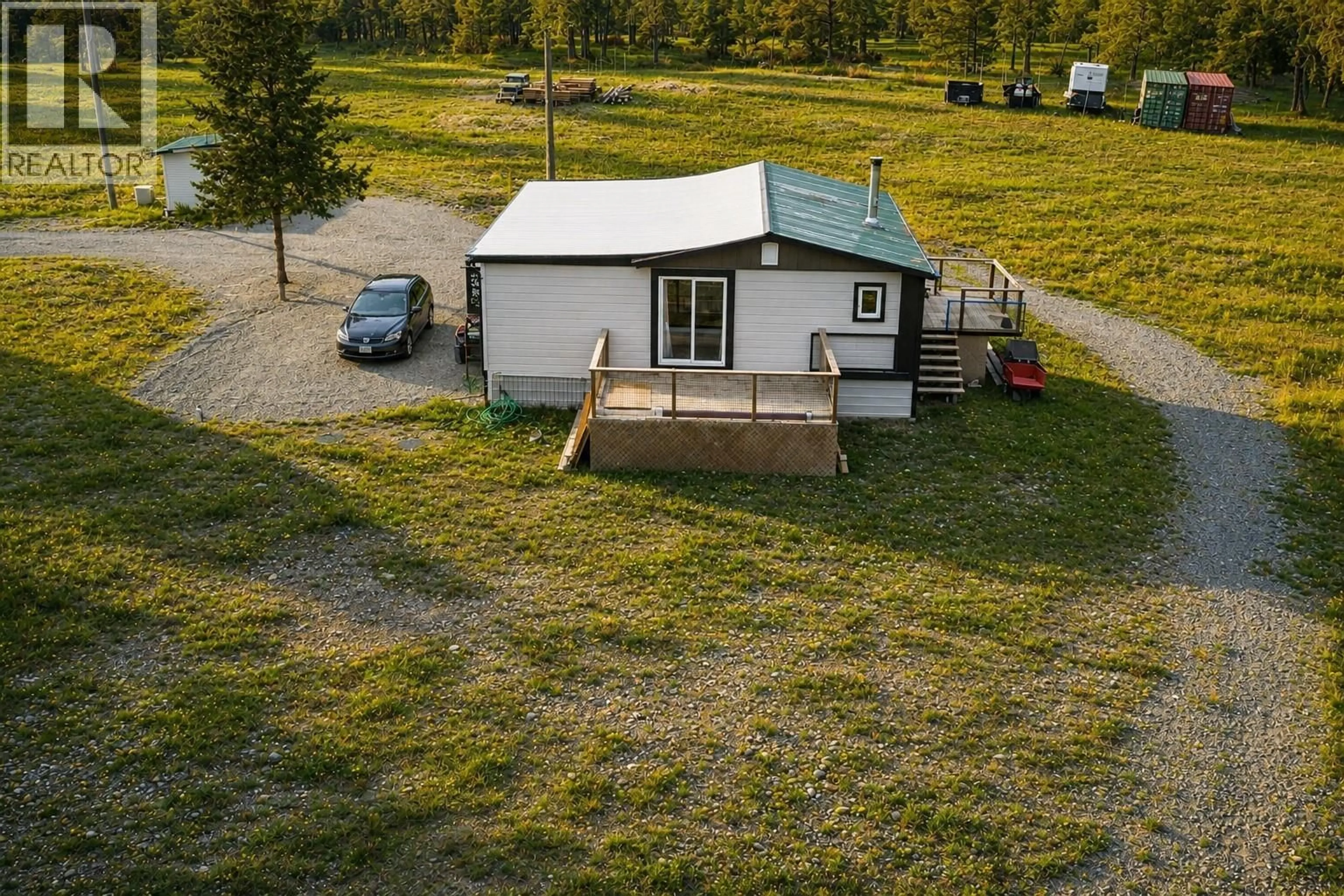 A pic from outside/outdoor area/front of a property/back of a property/a pic from drone, unknown for 5553 93/95 HIGHWAY, Ta Ta Creek British Columbia V0B2E0
