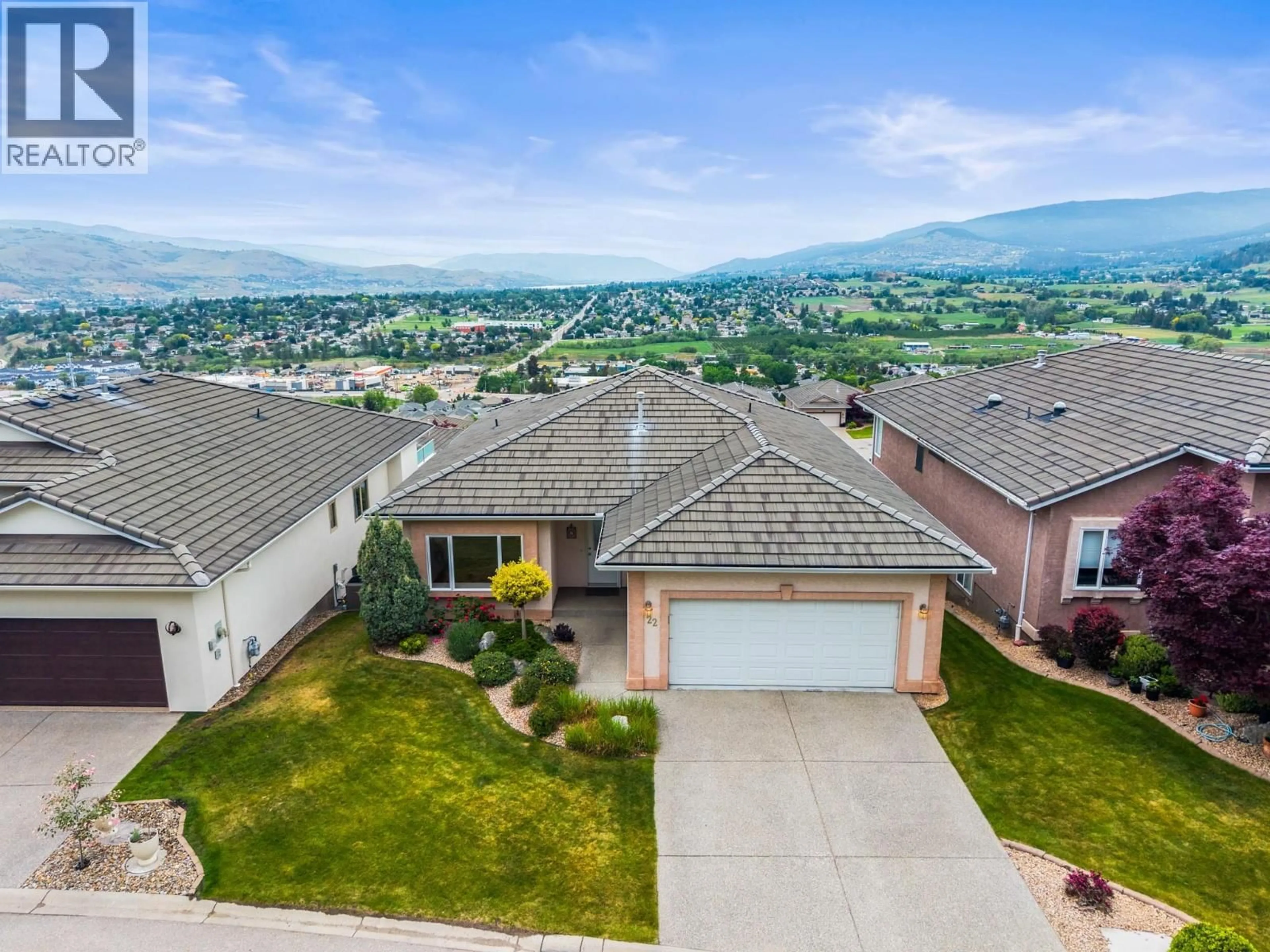A pic from outside/outdoor area/front of a property/back of a property/a pic from drone, mountain view for 22 QUAIL VISTA PLACE, Vernon British Columbia V1B3X9