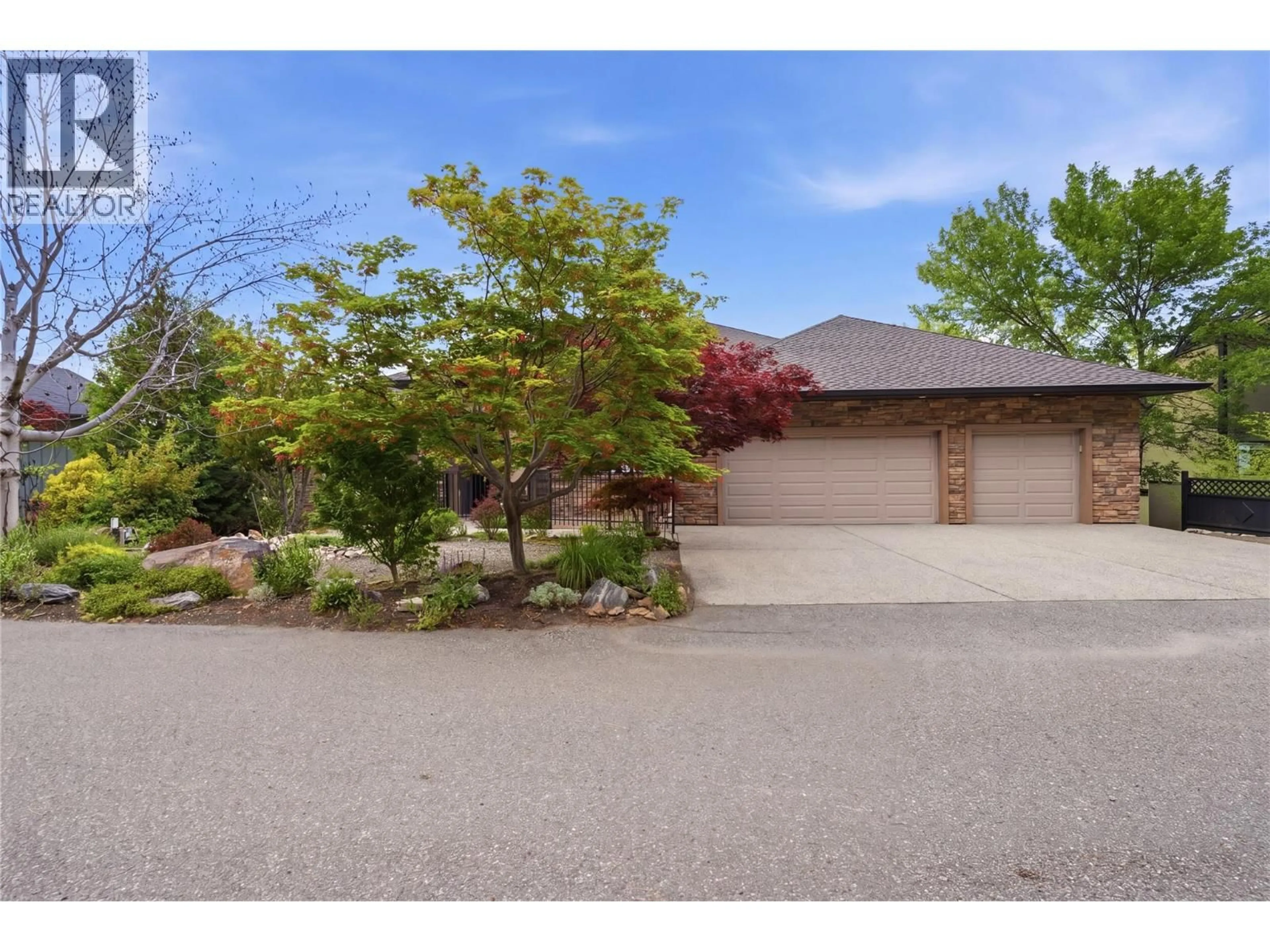 A pic from outside/outdoor area/front of a property/back of a property/a pic from drone, street for 448 VIEWCREST ROAD, Kelowna British Columbia V1W4K1