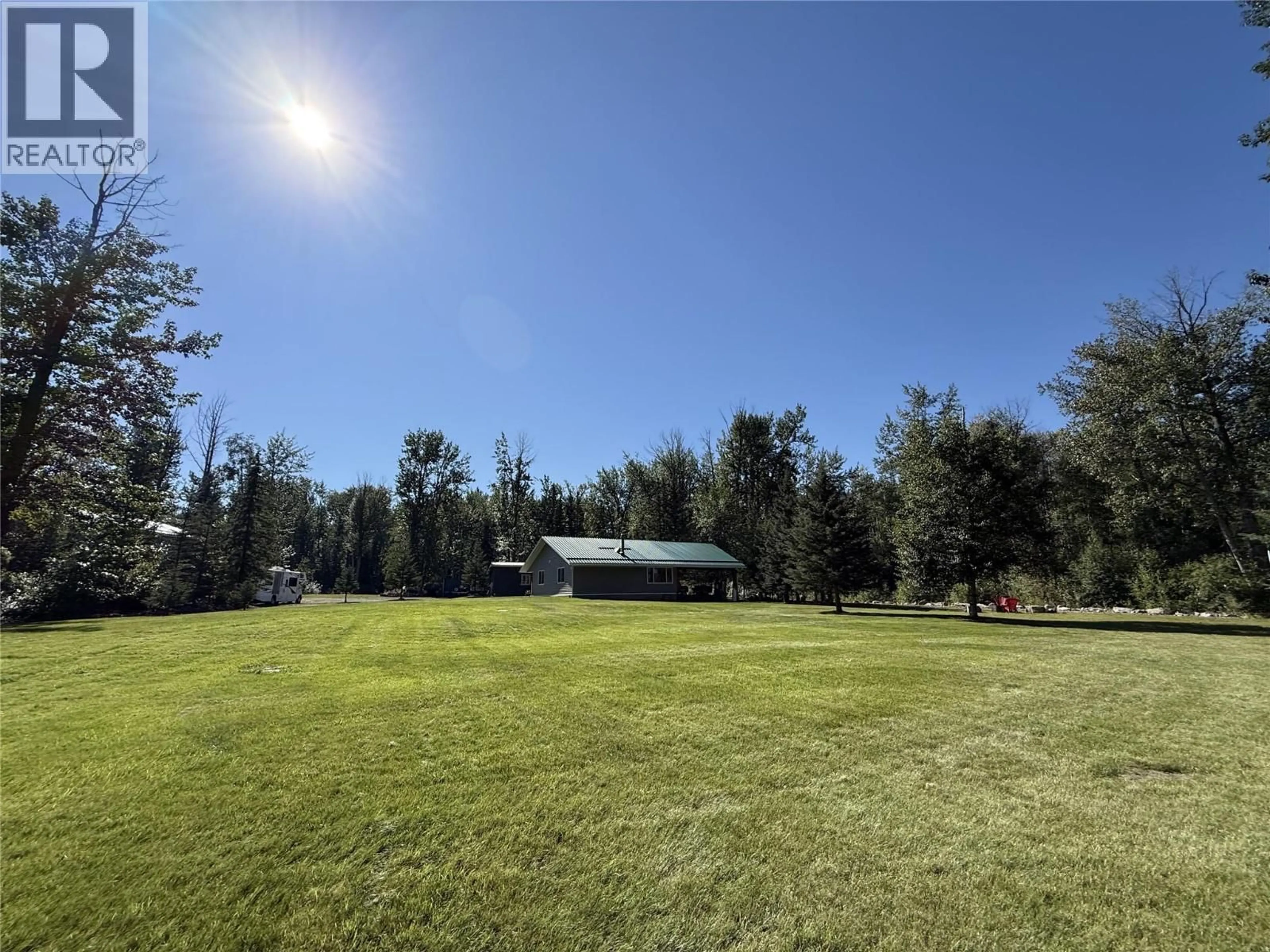 A pic from outside/outdoor area/front of a property/back of a property/a pic from drone, unknown for 6567 YIPS OTHER, Moberly Lake British Columbia V0C1X0