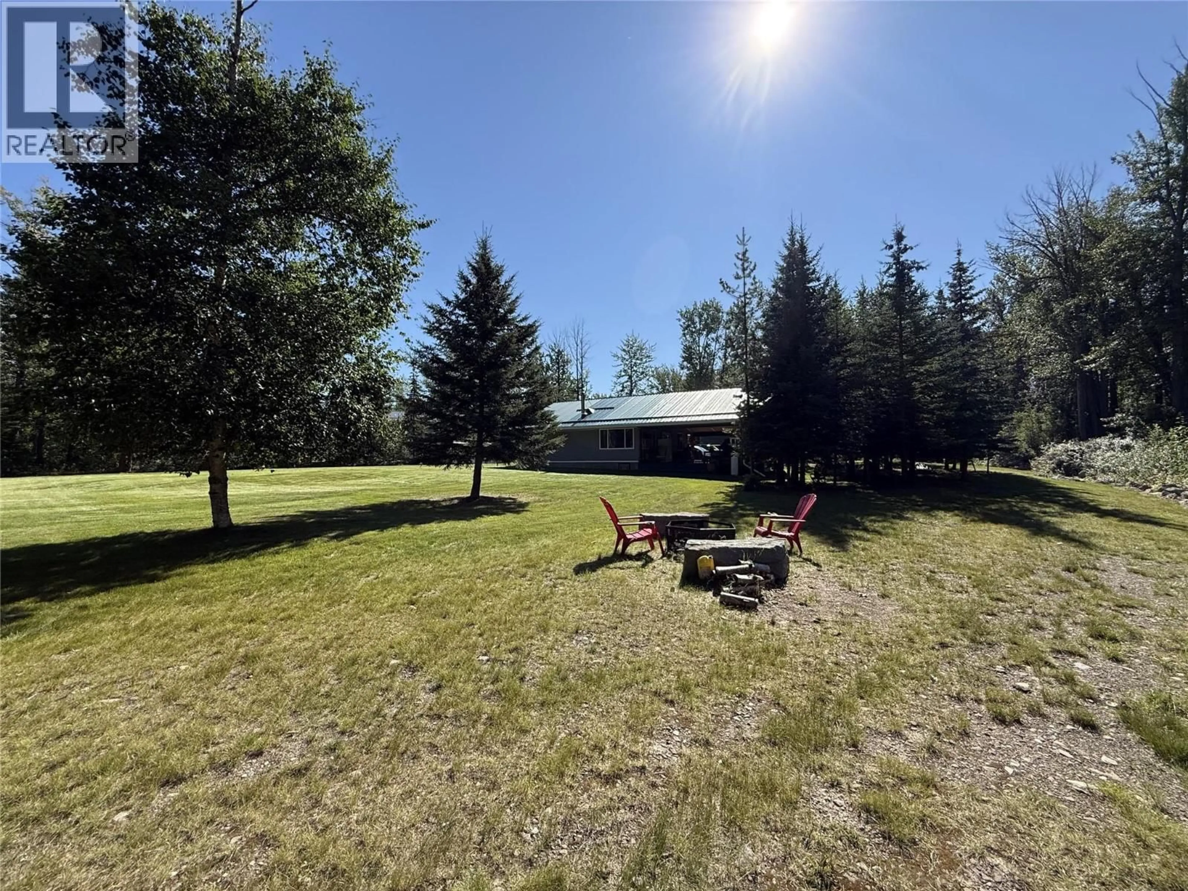 A pic from outside/outdoor area/front of a property/back of a property/a pic from drone, forest/trees view for 6567 YIPS OTHER, Moberly Lake British Columbia V0C1X0
