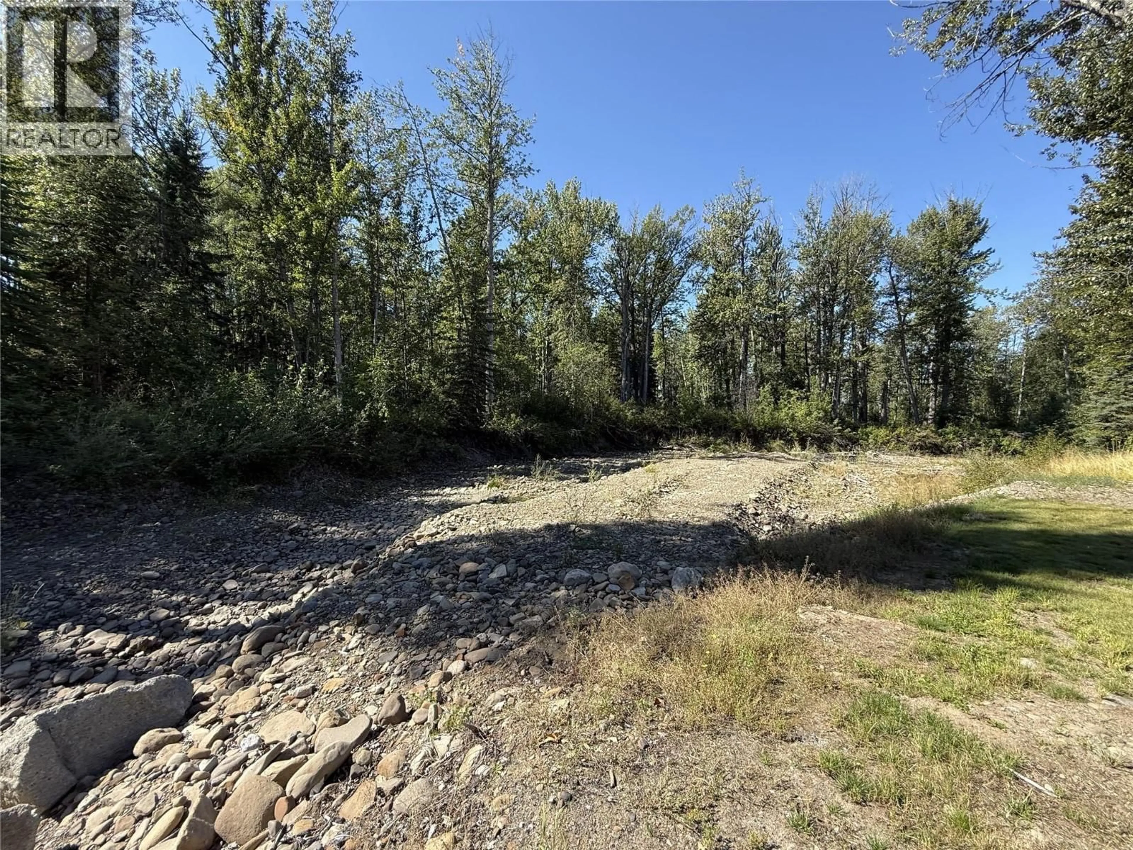 A pic from outside/outdoor area/front of a property/back of a property/a pic from drone, forest/trees view for 6567 YIPS OTHER, Moberly Lake British Columbia V0C1X0