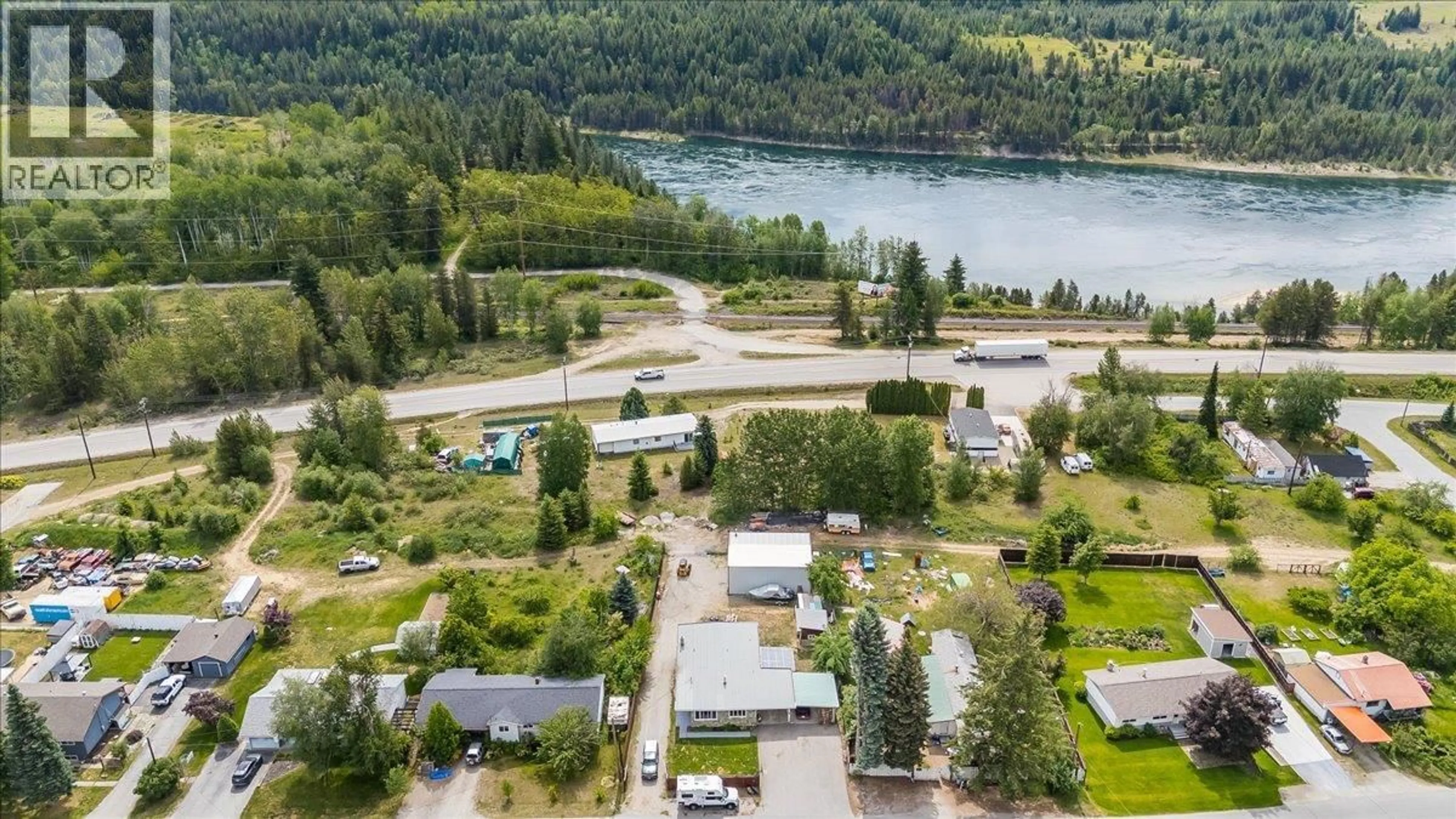A pic from outside/outdoor area/front of a property/back of a property/a pic from drone, water/lake/river/ocean view for 609 201ST AVENUE, Castlegar British Columbia V1N3R1