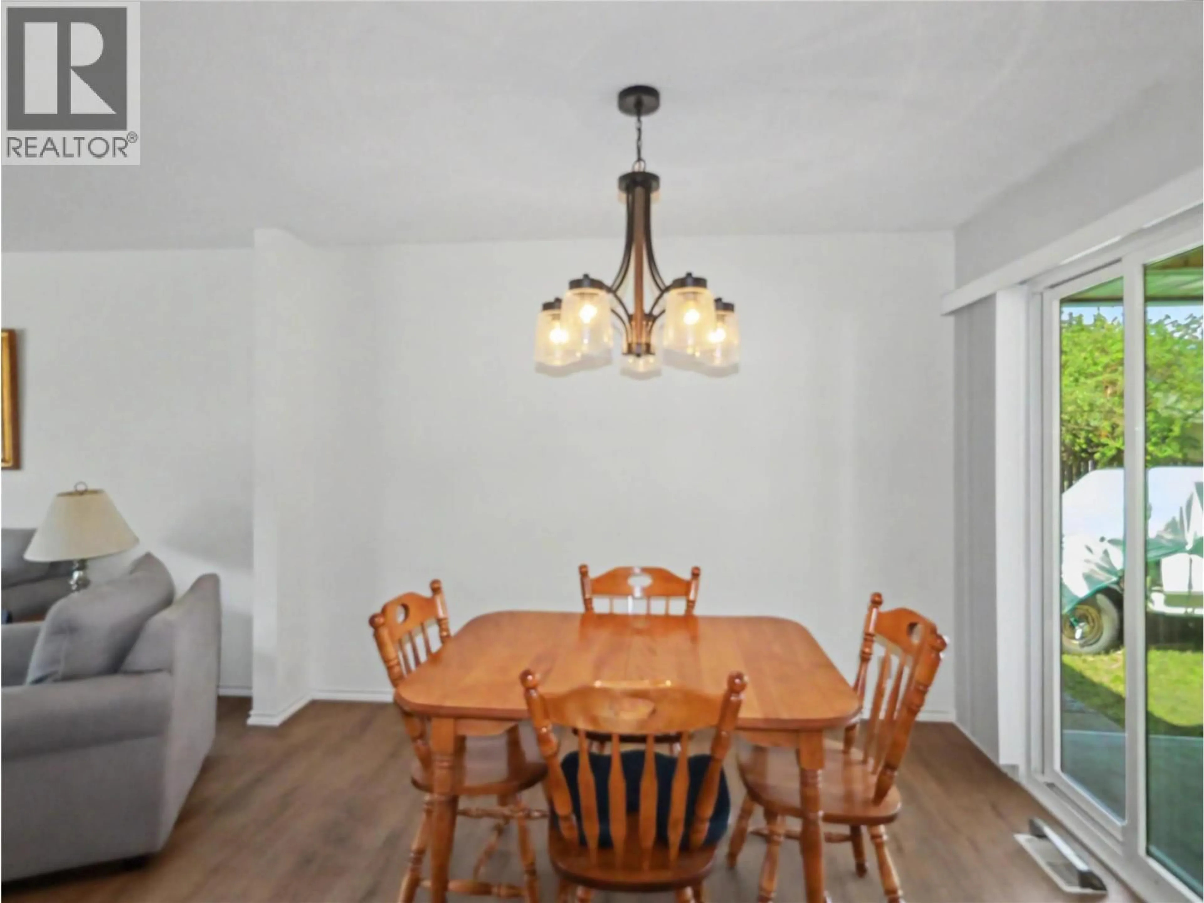 Dining room, wood/laminate floor for 1383 68TH AVENUE, Grand Forks British Columbia V0H1H0