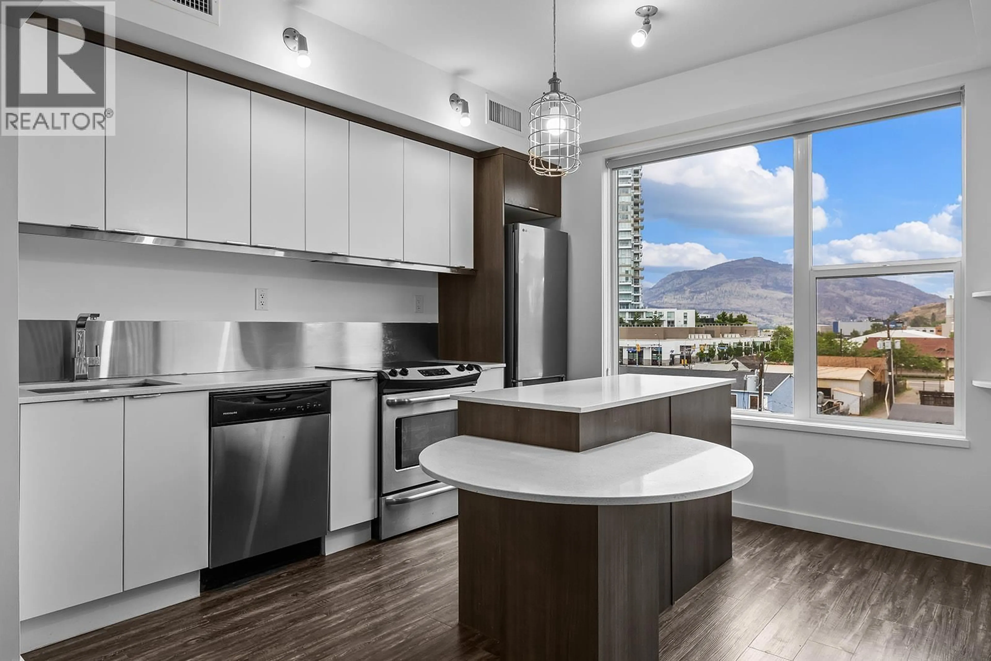 Open concept kitchen, unknown for 402 - 1290 ST. PAUL STREET, Kelowna British Columbia V1Y2C9