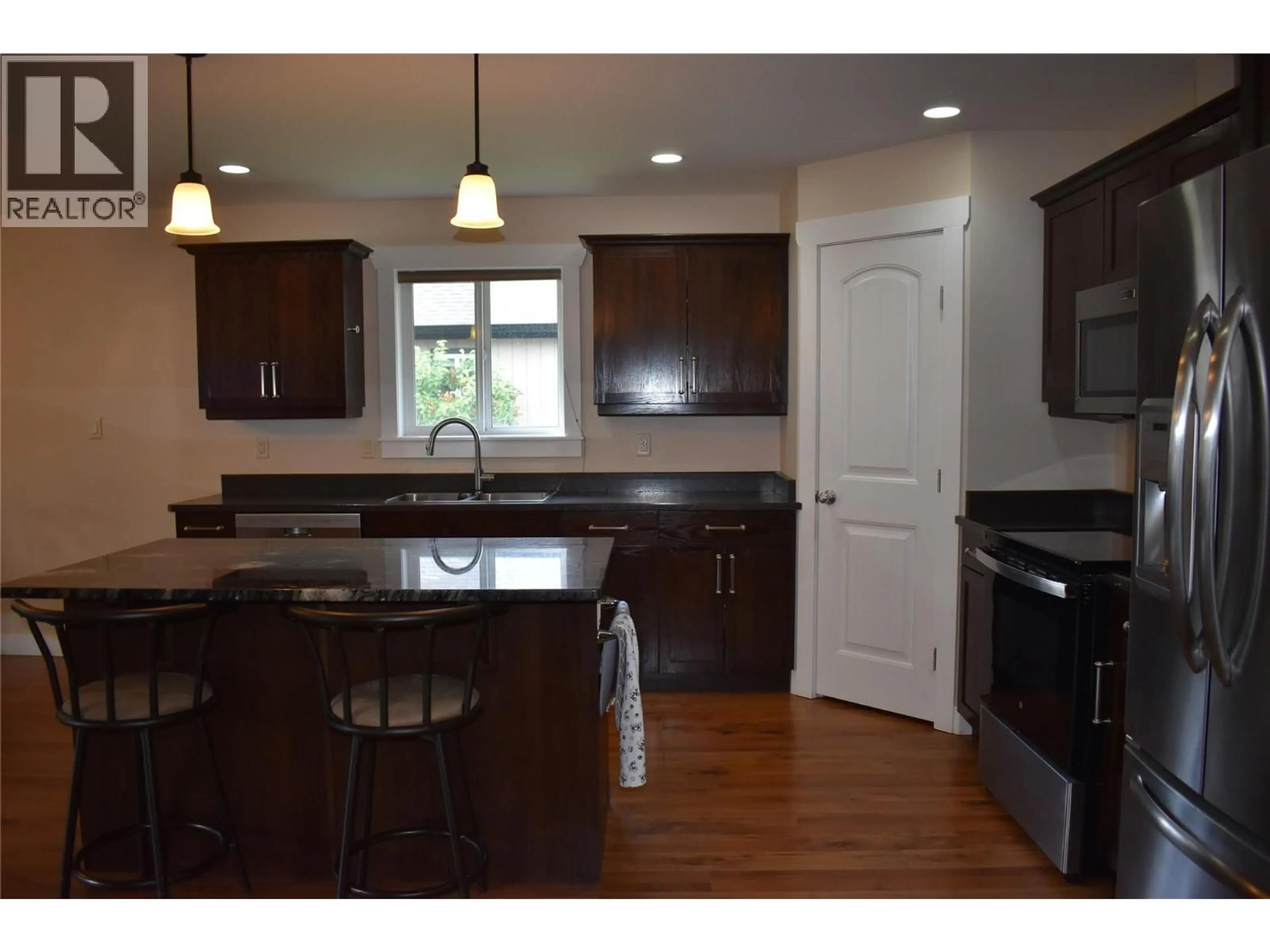 Open concept kitchen, unknown for 207 - 4400 MCLEAN CREEK ROAD, Okanagan Falls British Columbia V0H1R6