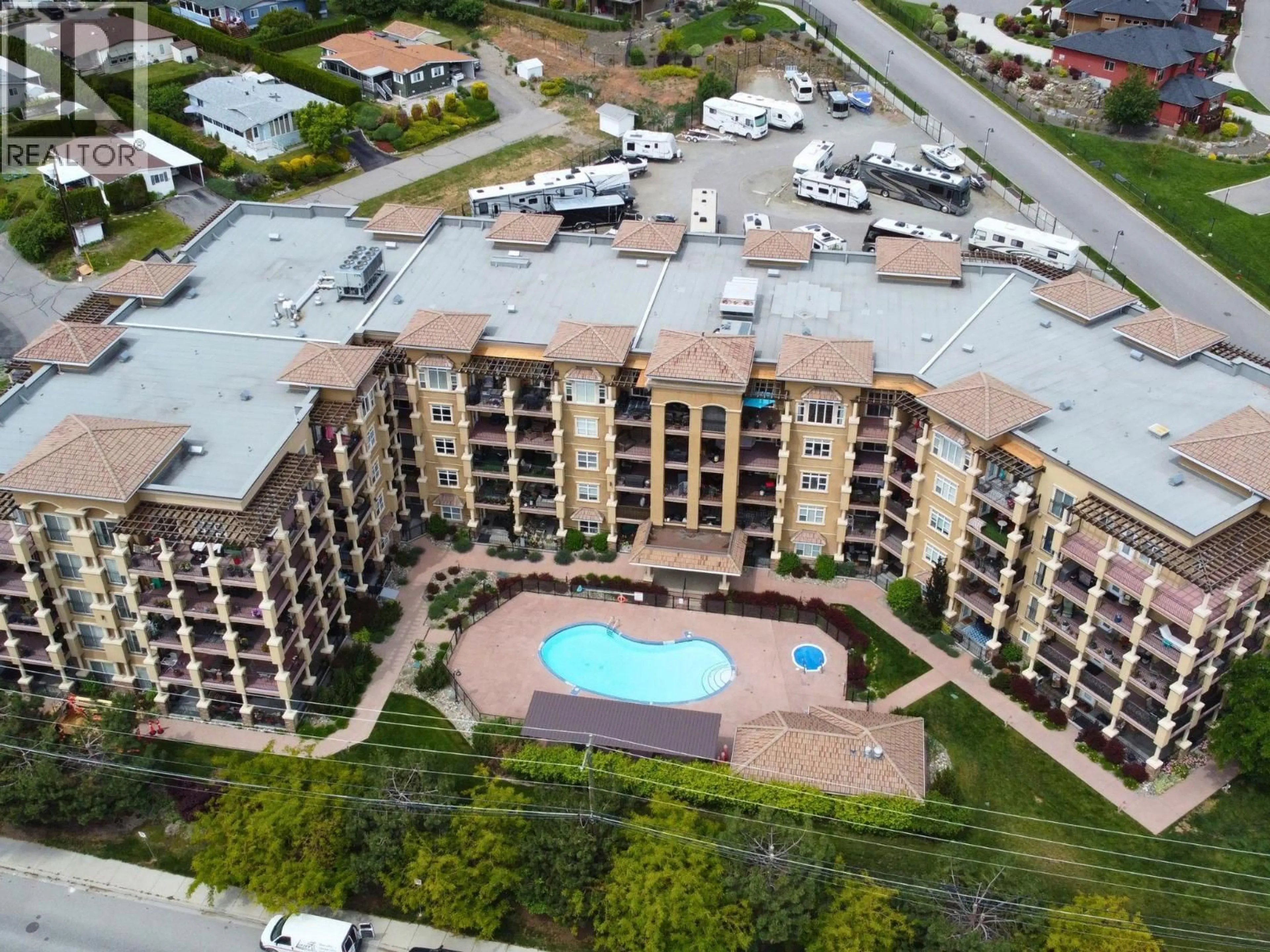 A pic from outside/outdoor area/front of a property/back of a property/a pic from drone, unknown for 402 - 2070 BOUCHERIE ROAD, West Kelowna British Columbia V4T3K9