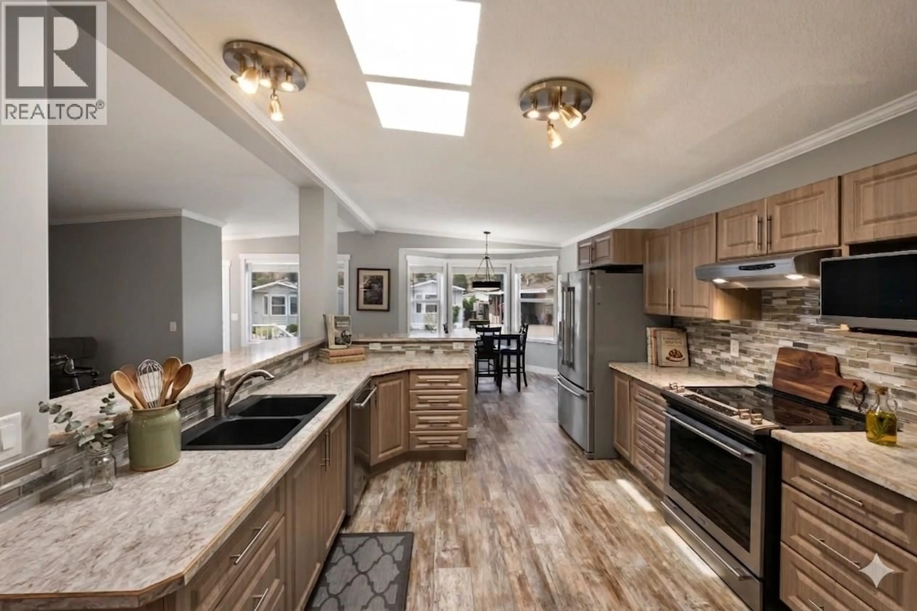 Open concept kitchen, unknown for 93 - 8598 97 HIGHWAY, Oliver British Columbia V0H1T2