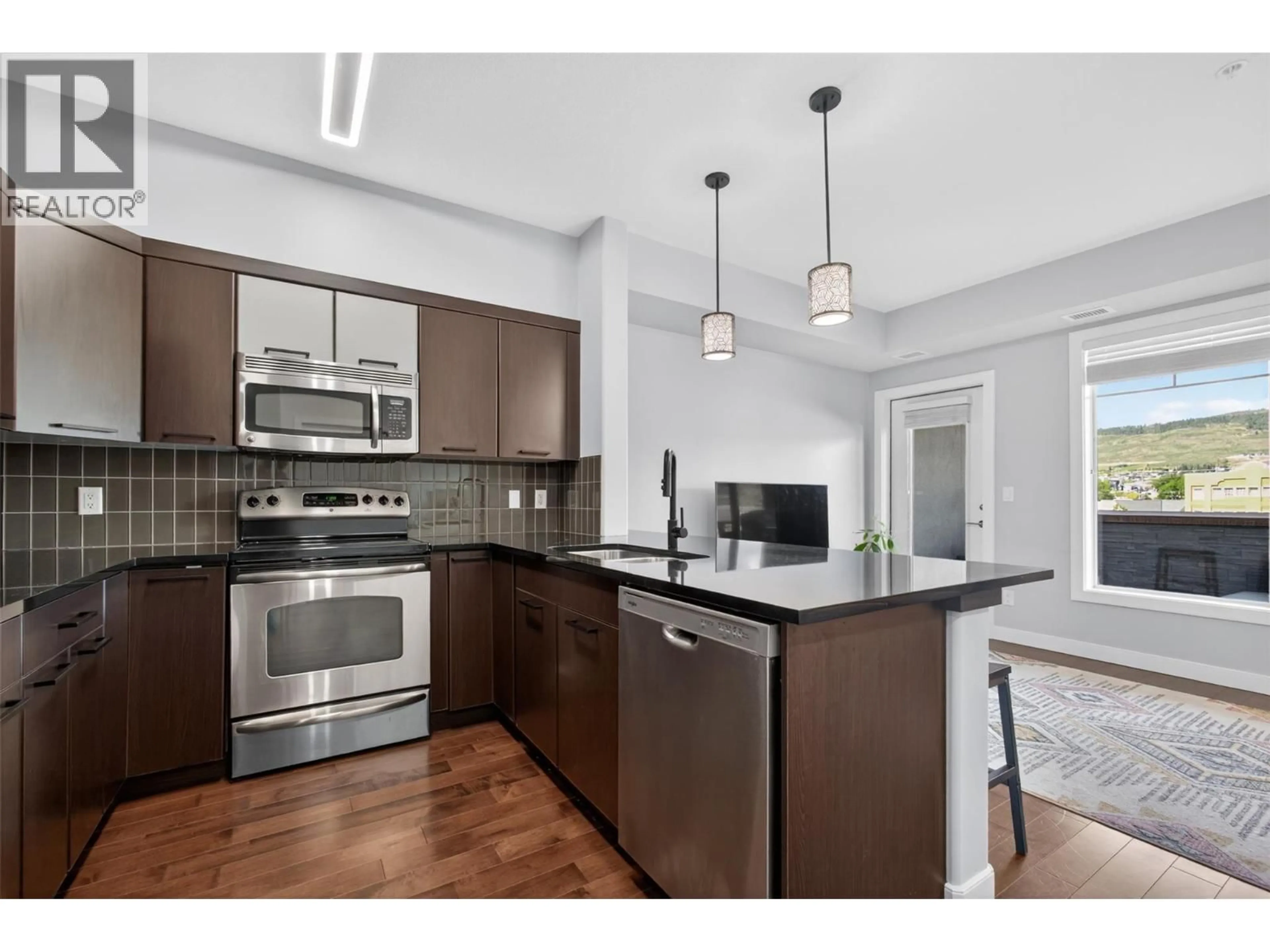 Open concept kitchen, unknown for 407 - 3645 CARRINGTON ROAD, West Kelowna British Columbia V4T3G9