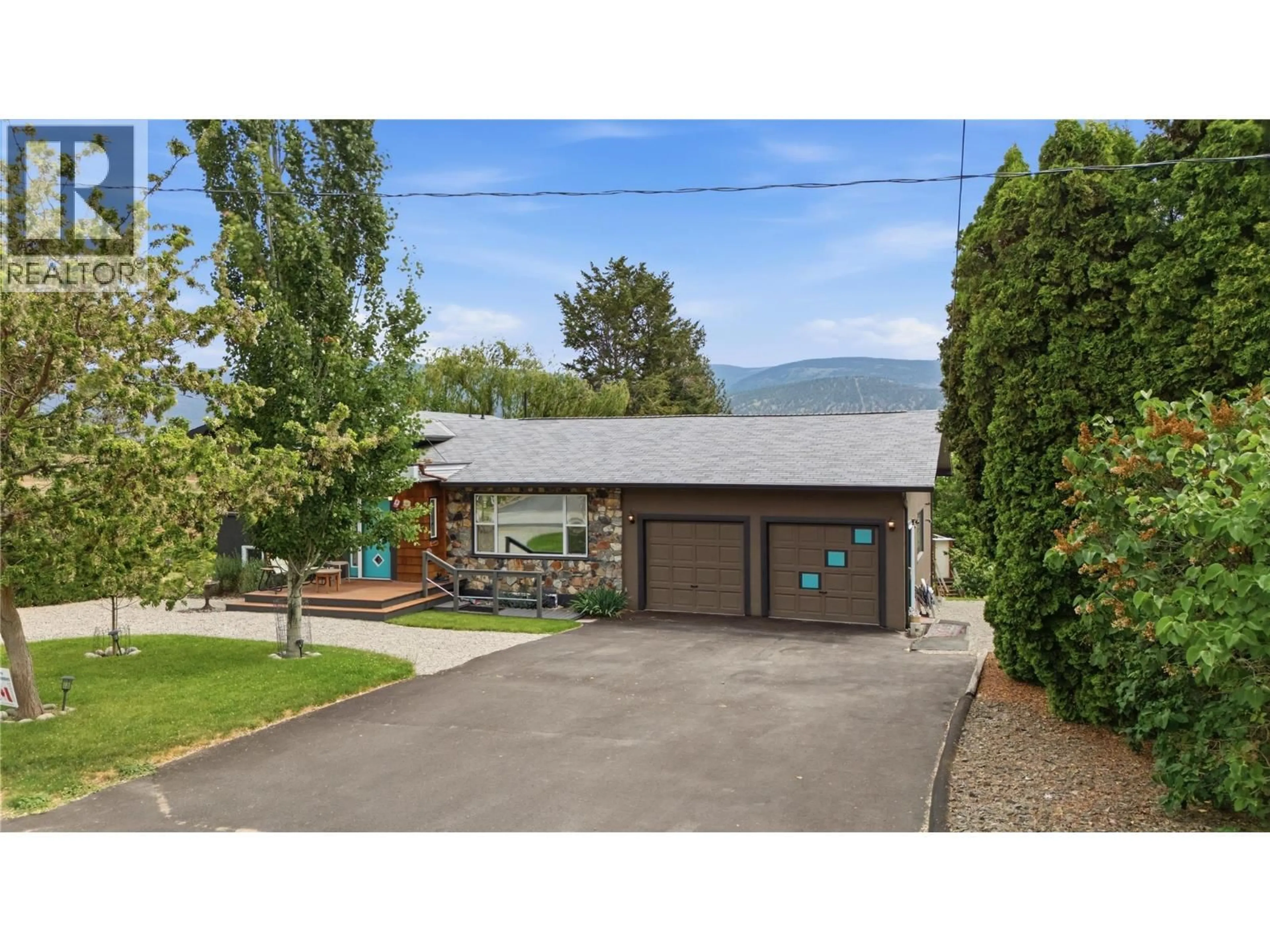 A pic from outside/outdoor area/front of a property/back of a property/a pic from drone, mountain view for 1019 VETERAN DRIVE, Penticton British Columbia V2A7K8